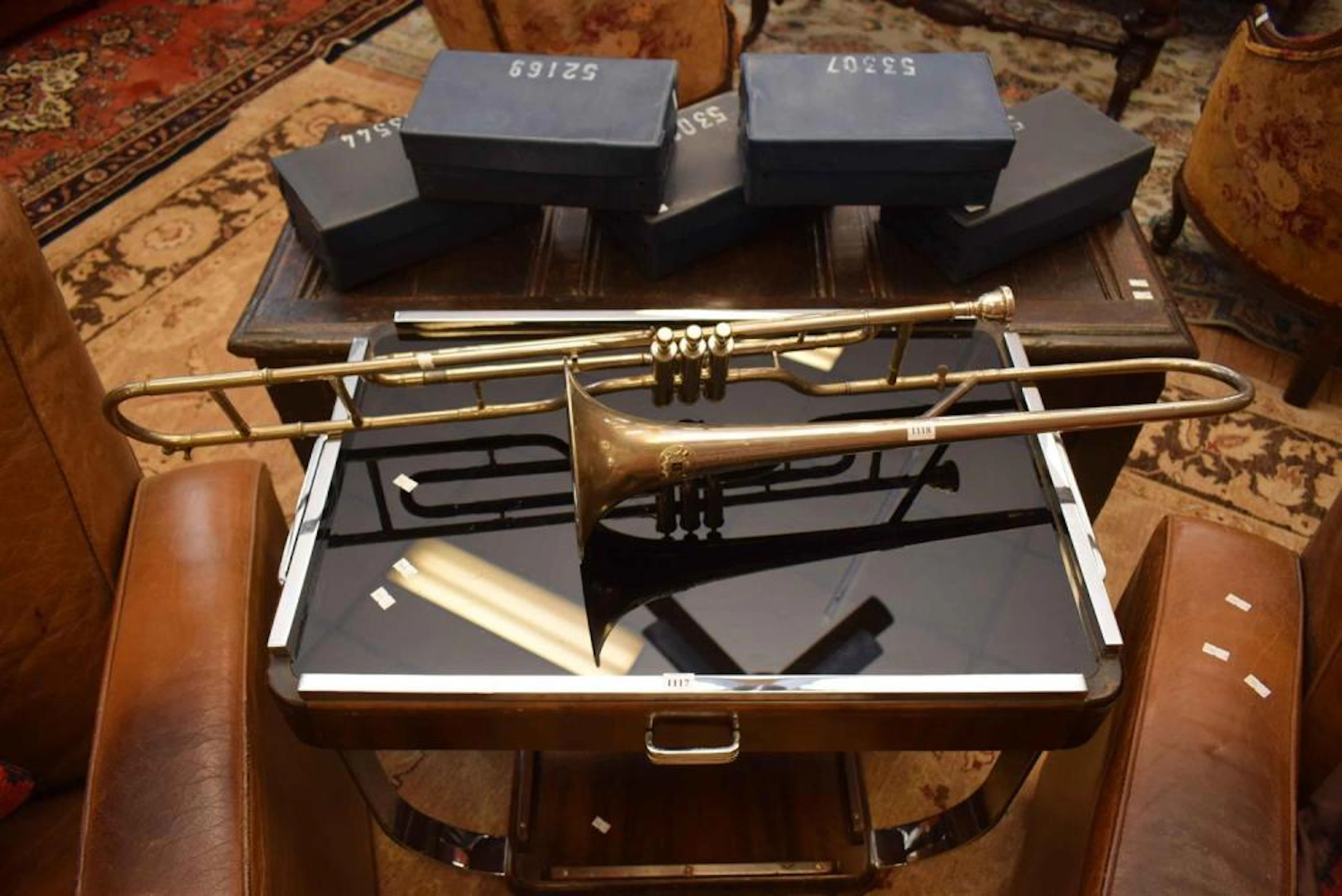 AN ANTIQUE BERAT AND FILS TROMBONE