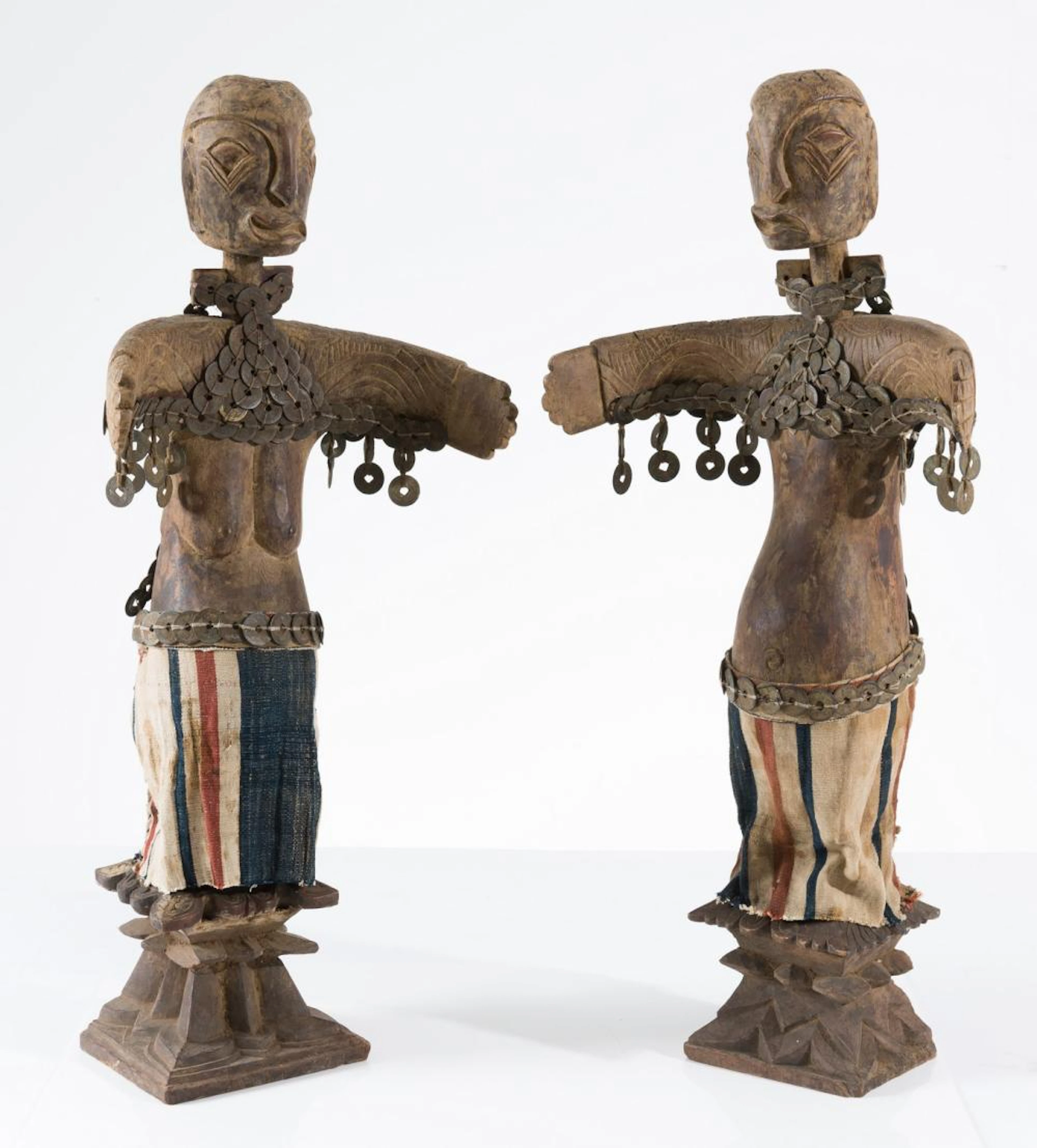 A PAIR OF INDONESIAN ANCESTOR FIGURES CIRCA FIRST HALF 20TH CENTURY
