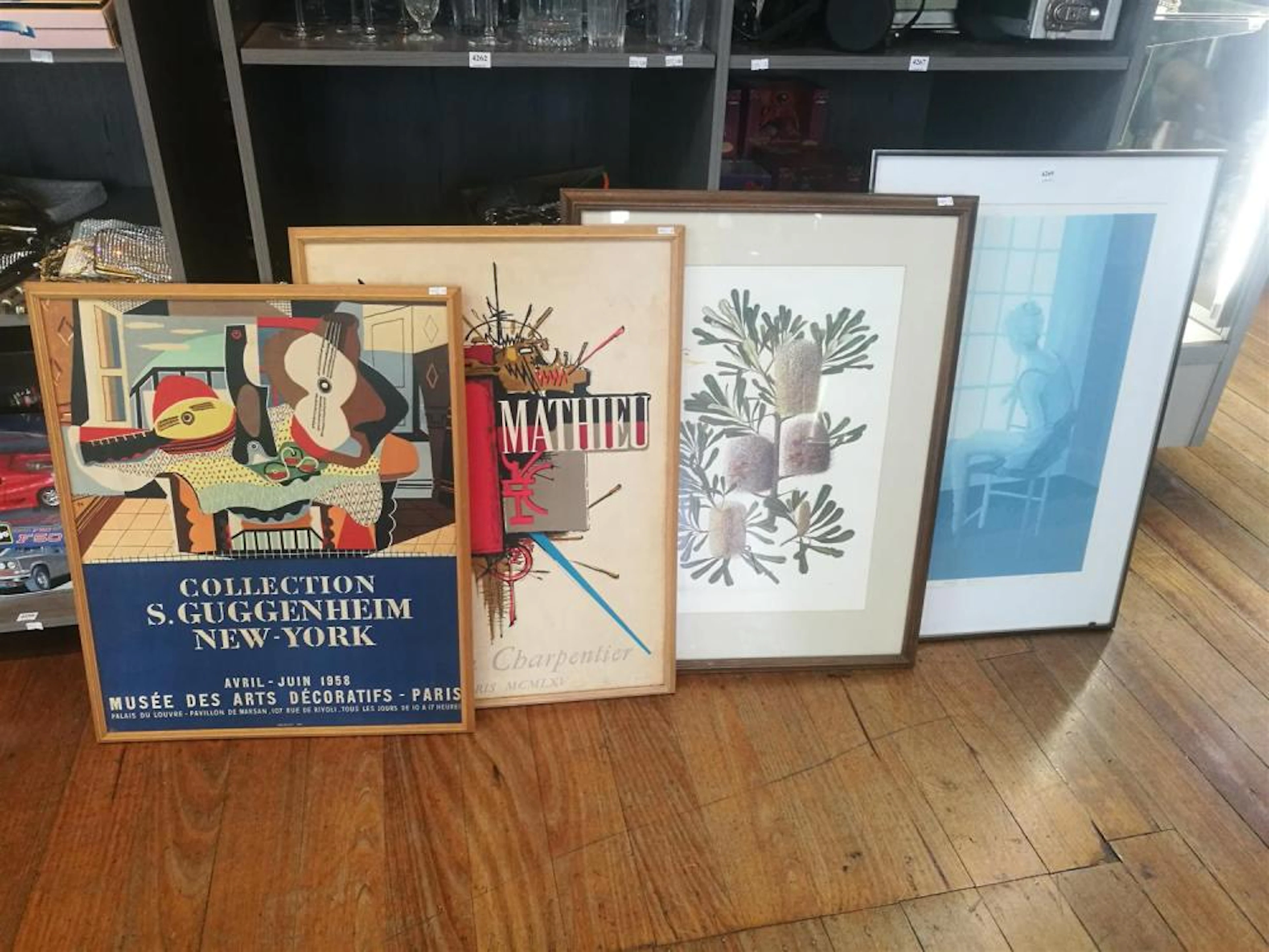 A COLLECTION OF FRAMED WORKS INCLUDING ORIGINAL...