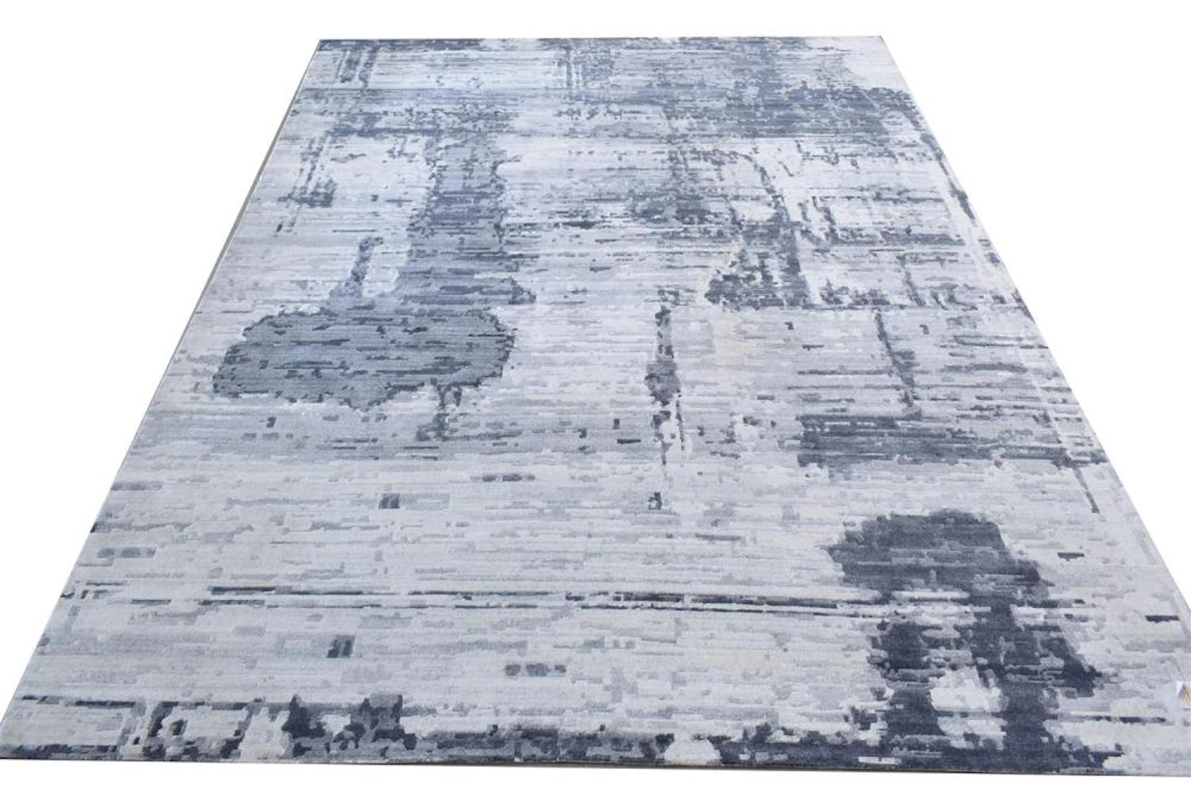 A BRAND NEW MODERN NEPALI HAND KNOT CARPET