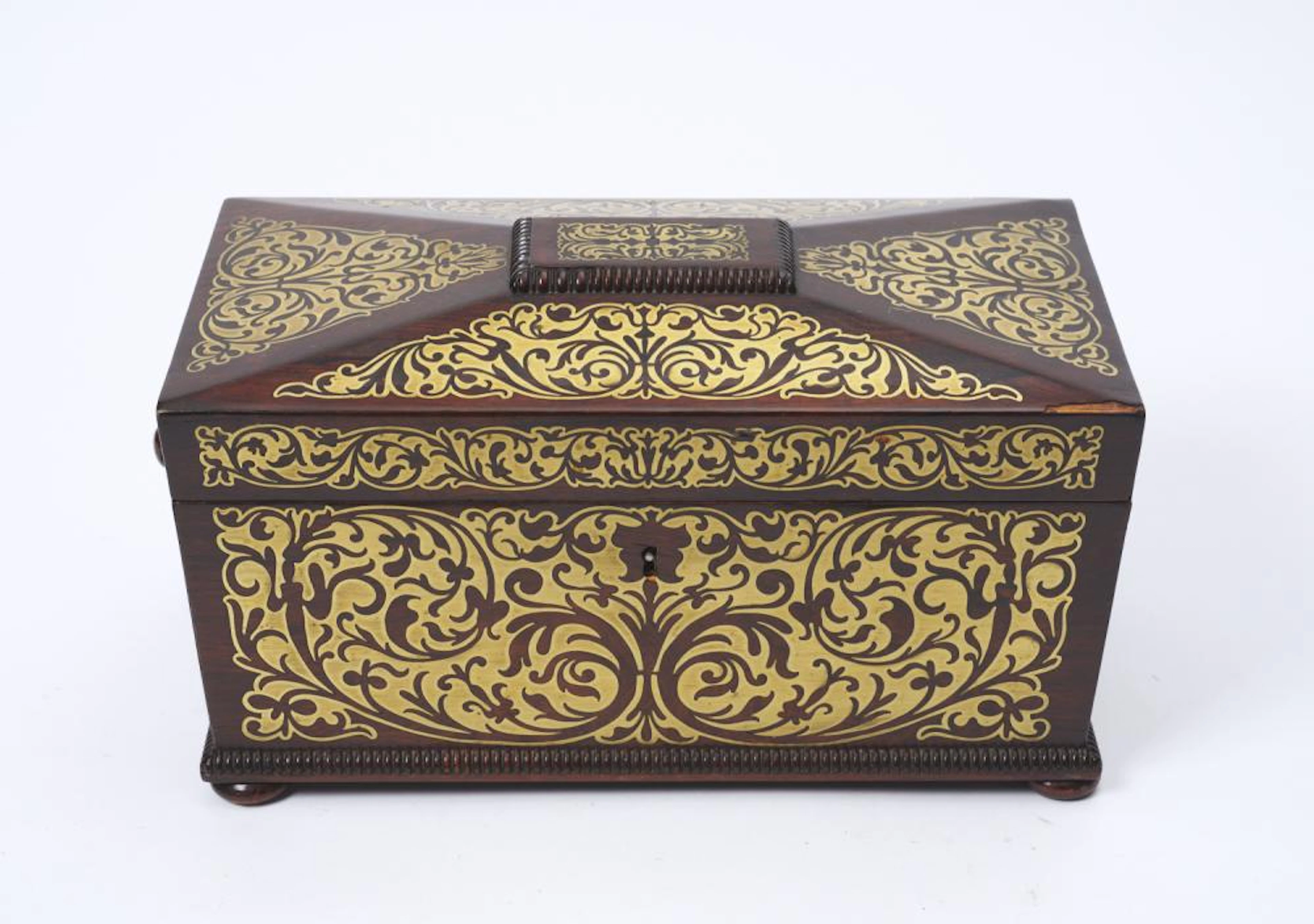 A 19TH CENTURY CUT BRASS INLAID ROSEWOOD SARCOPHAGUS TEA CADDY