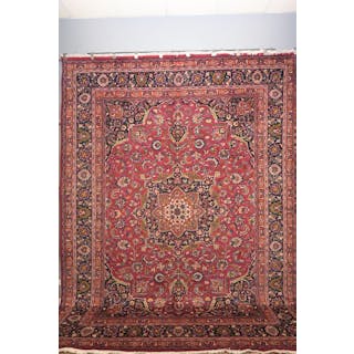 A SIGNED PIECE PERSIAN MASHAD CARPET FROM NORTHEAST PERSIA