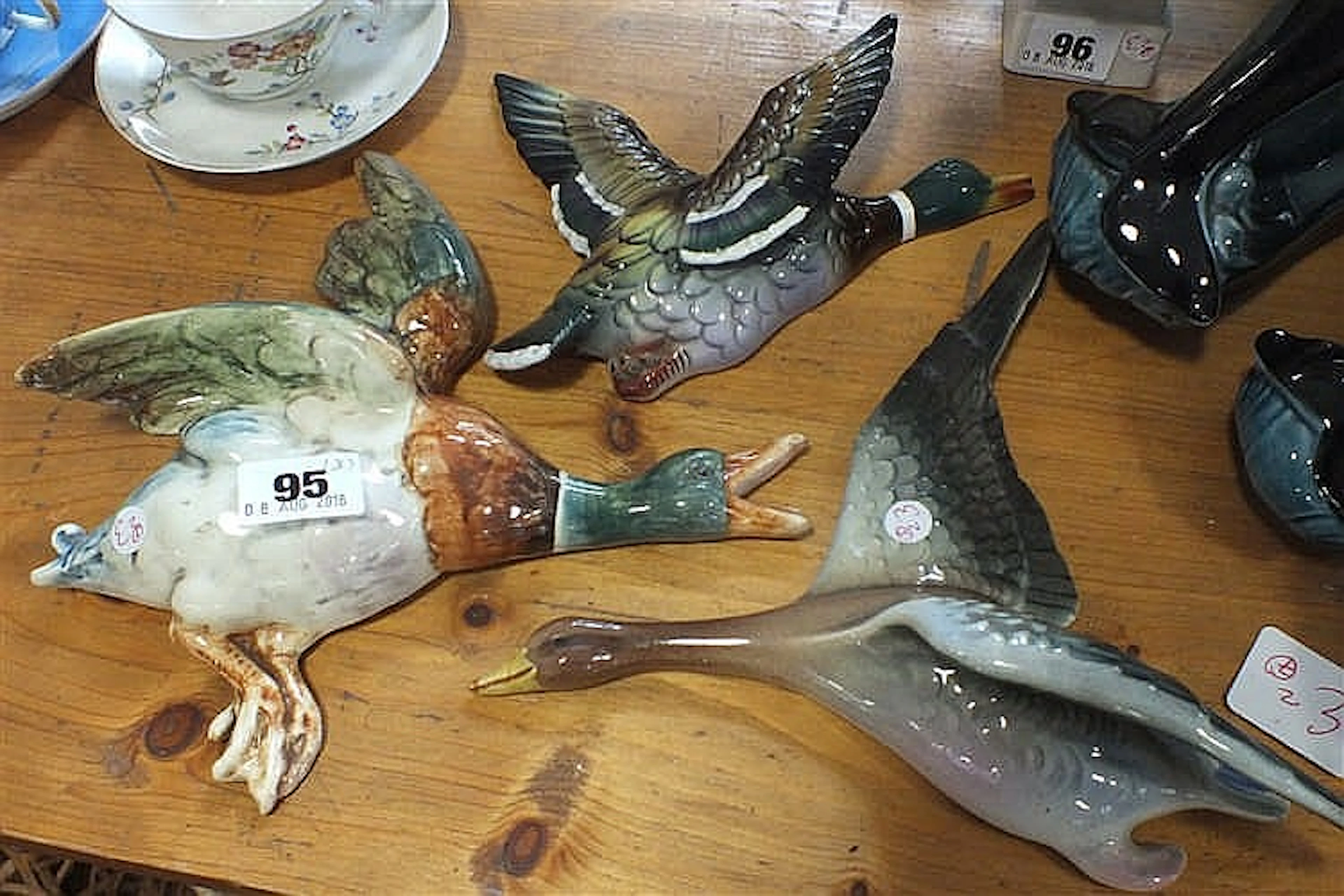 Trio of flying bird wall plaques