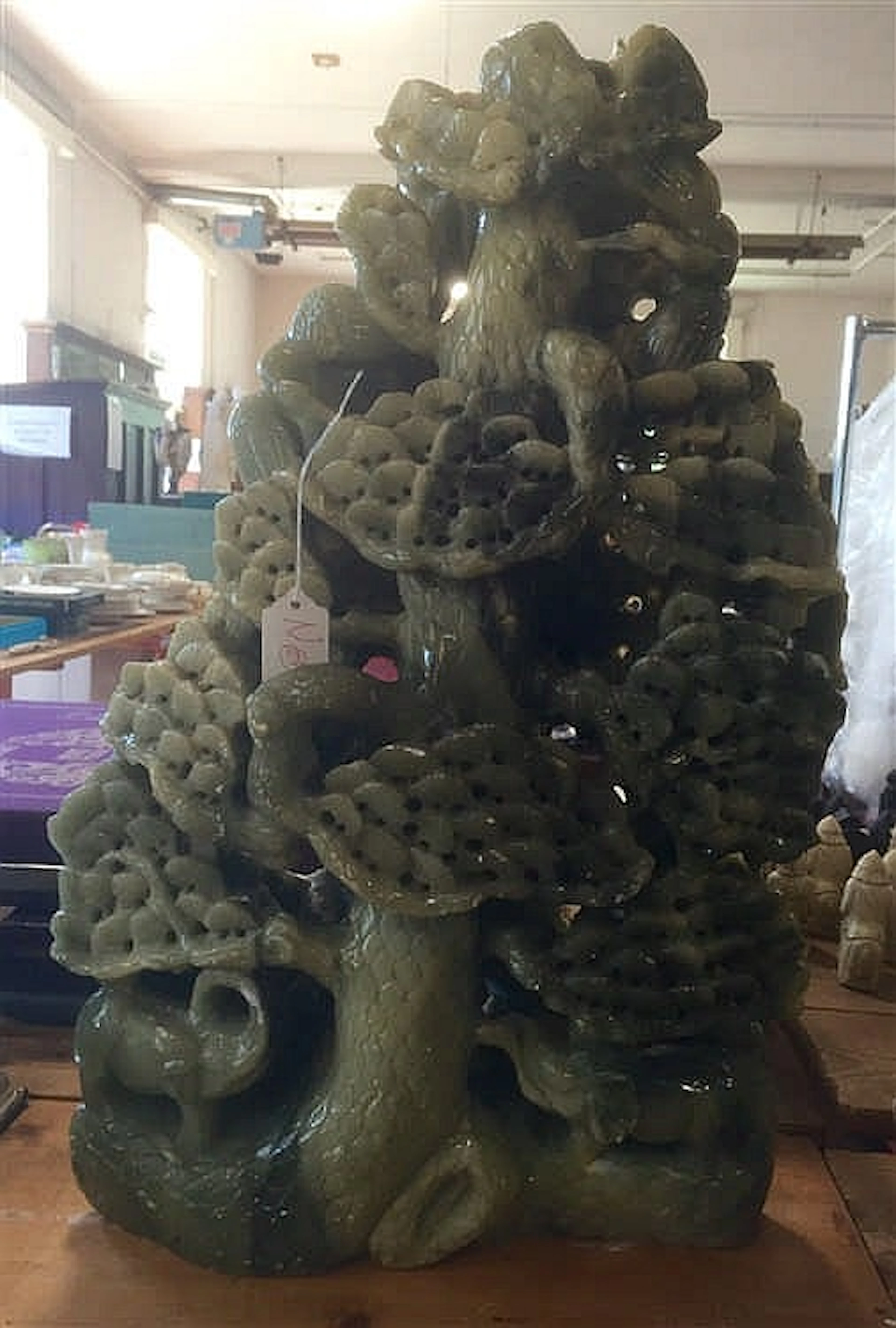 Very large green soapstone carving incorporating a tree and elephant 21½” h