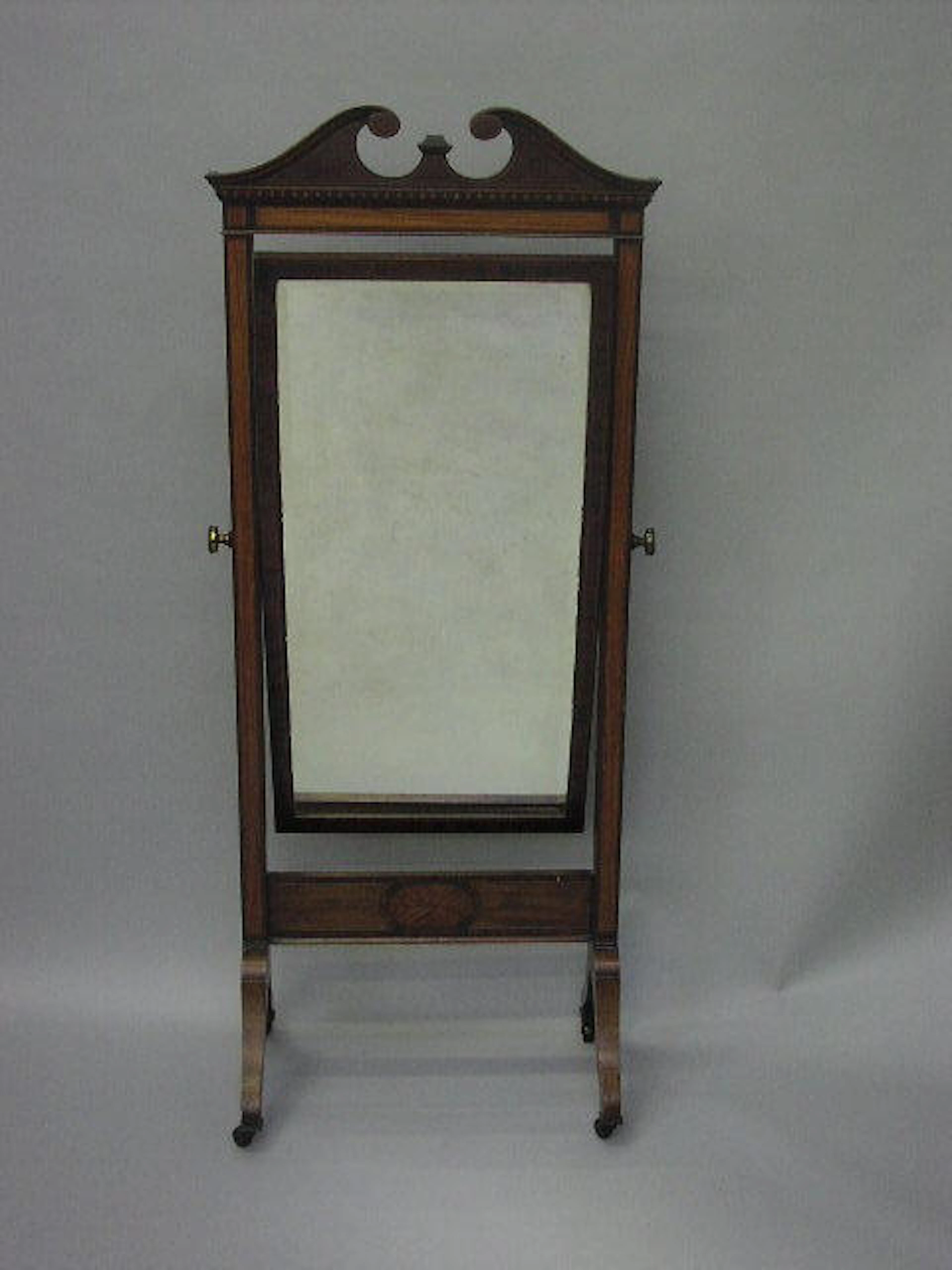 An Edwardian mahogany and satinwood strung cheval mirror,
