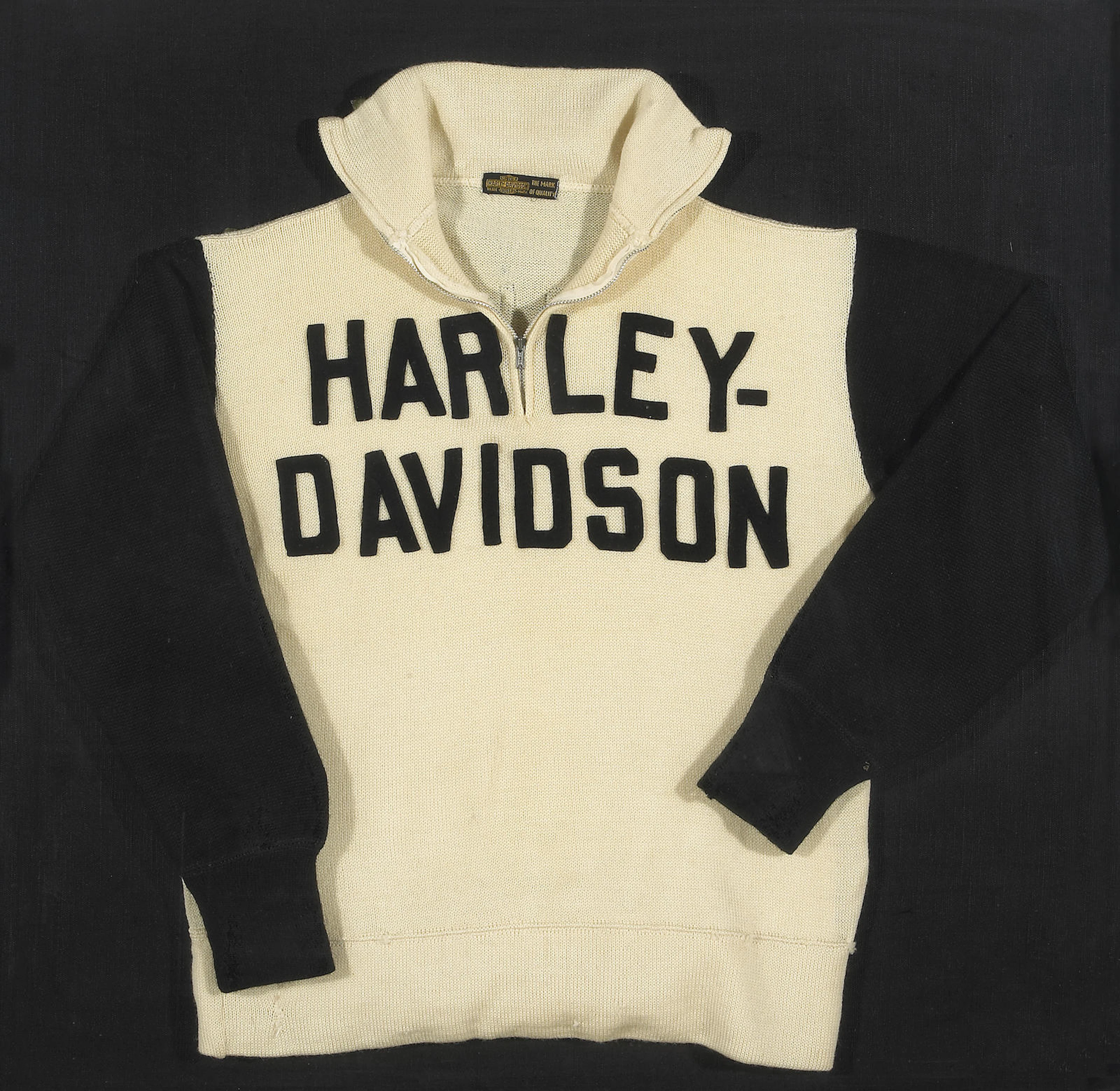 A vintage Harley-Davidson sweater Framed; 33 x 33 x 2½in