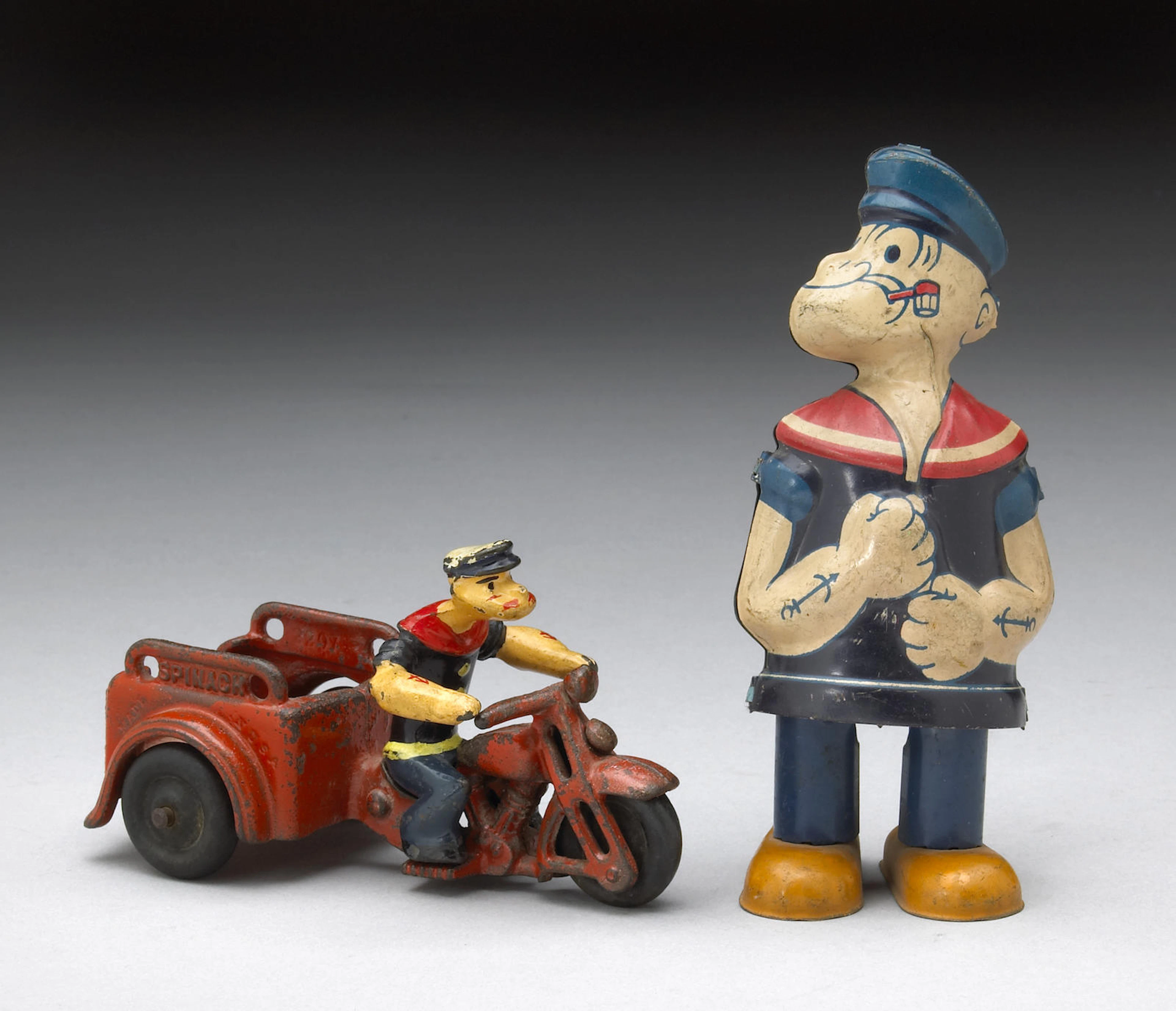 A Popeye toy grouping Length: 5in and Height: 6in