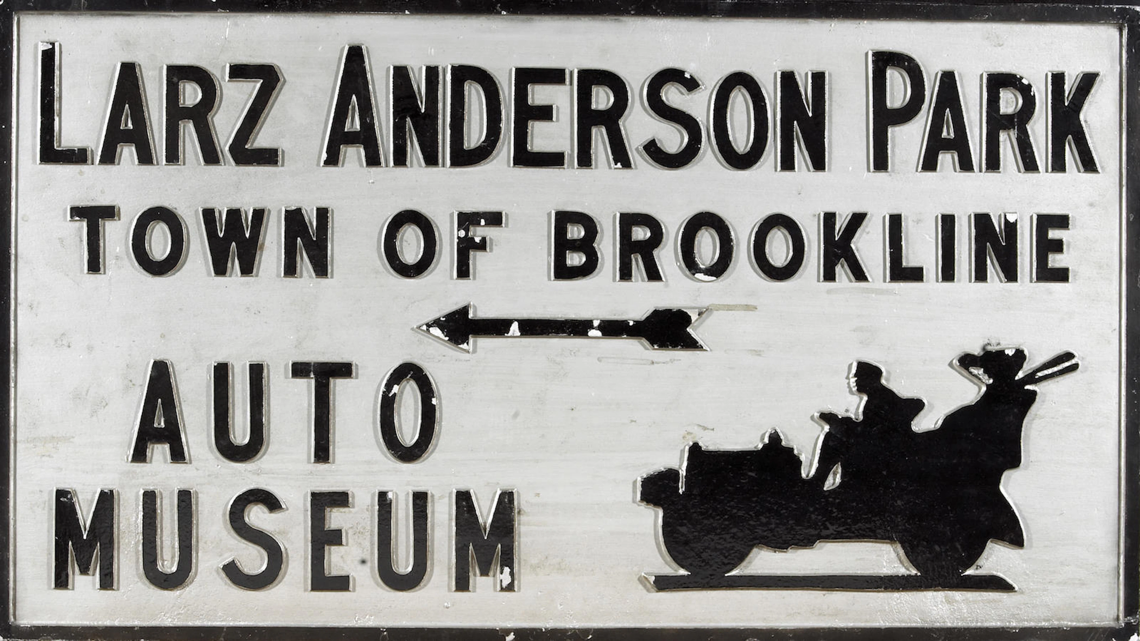 A direction sign to Larz Anderson Auto Museum,