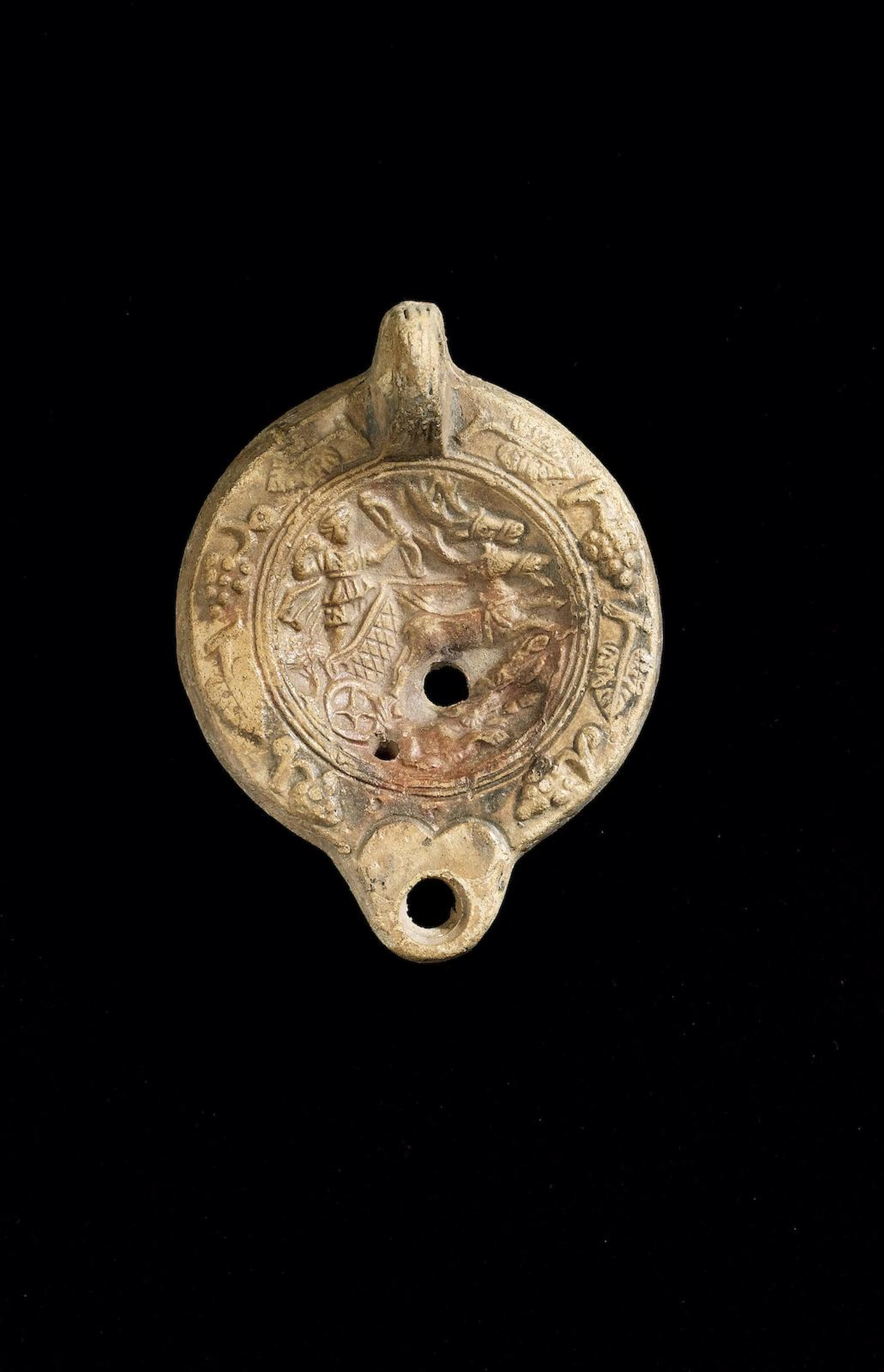 A large Roman terracotta lamp