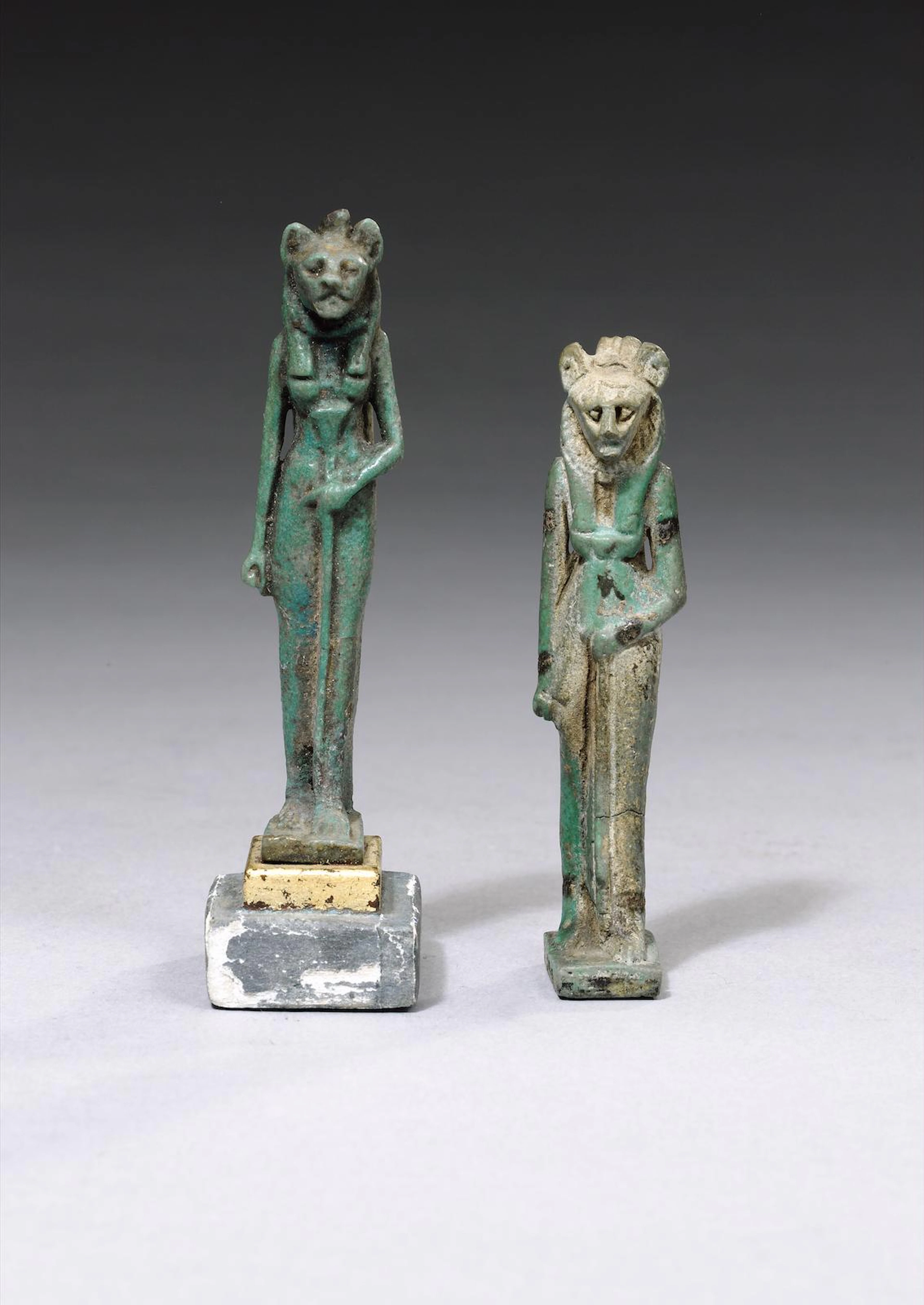 An Egyptian blue glazed composition amulet of Sekhmet and another Egyptian blue glazed composition amulet of Sekhmet, 2