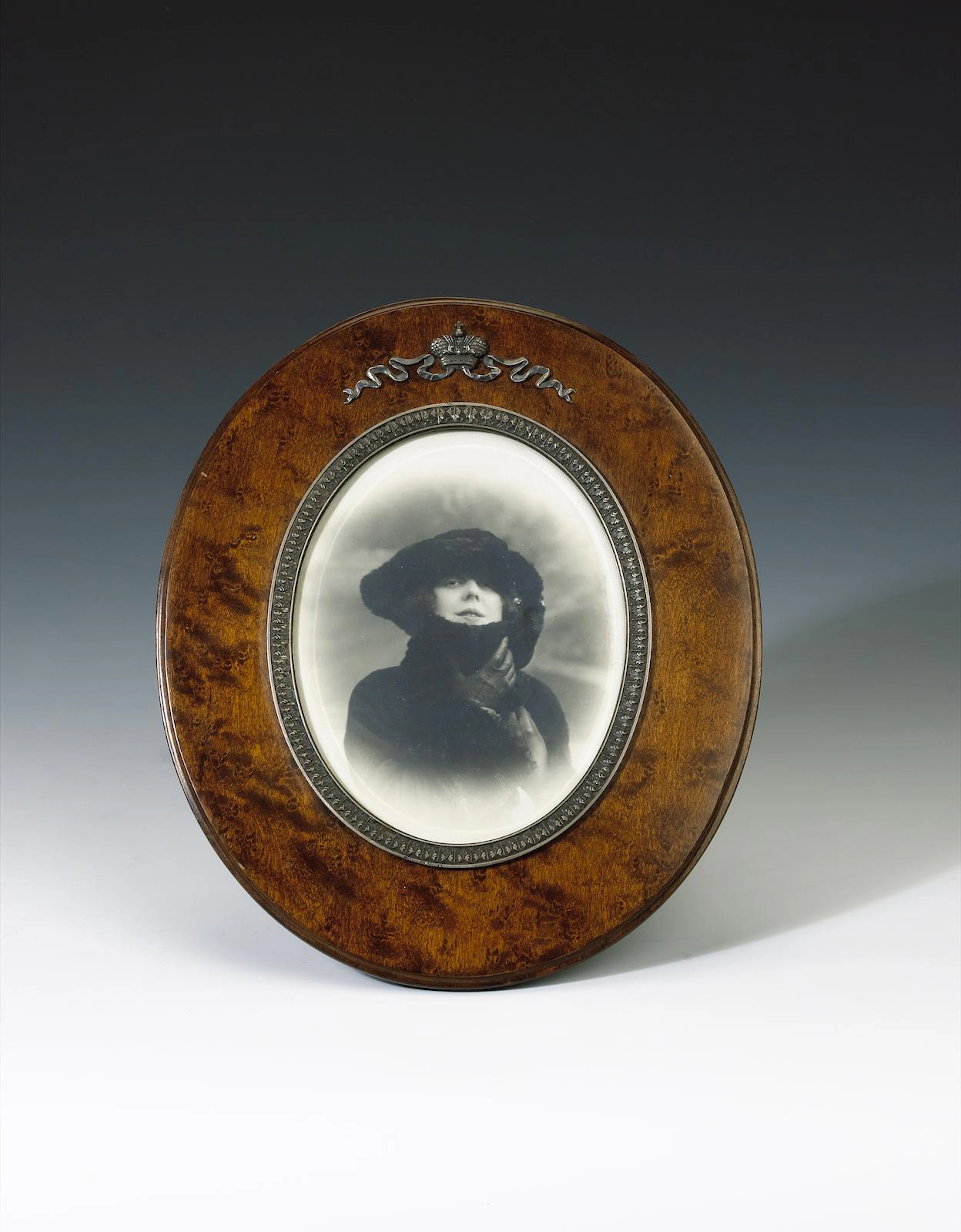 A Fabergé silver-mounted wooden frame, workmaster Karl Gustav Halmar Armfelt, St. Petersburg, circa 1900 height: 24.7 cm. (9 3/4 in.)