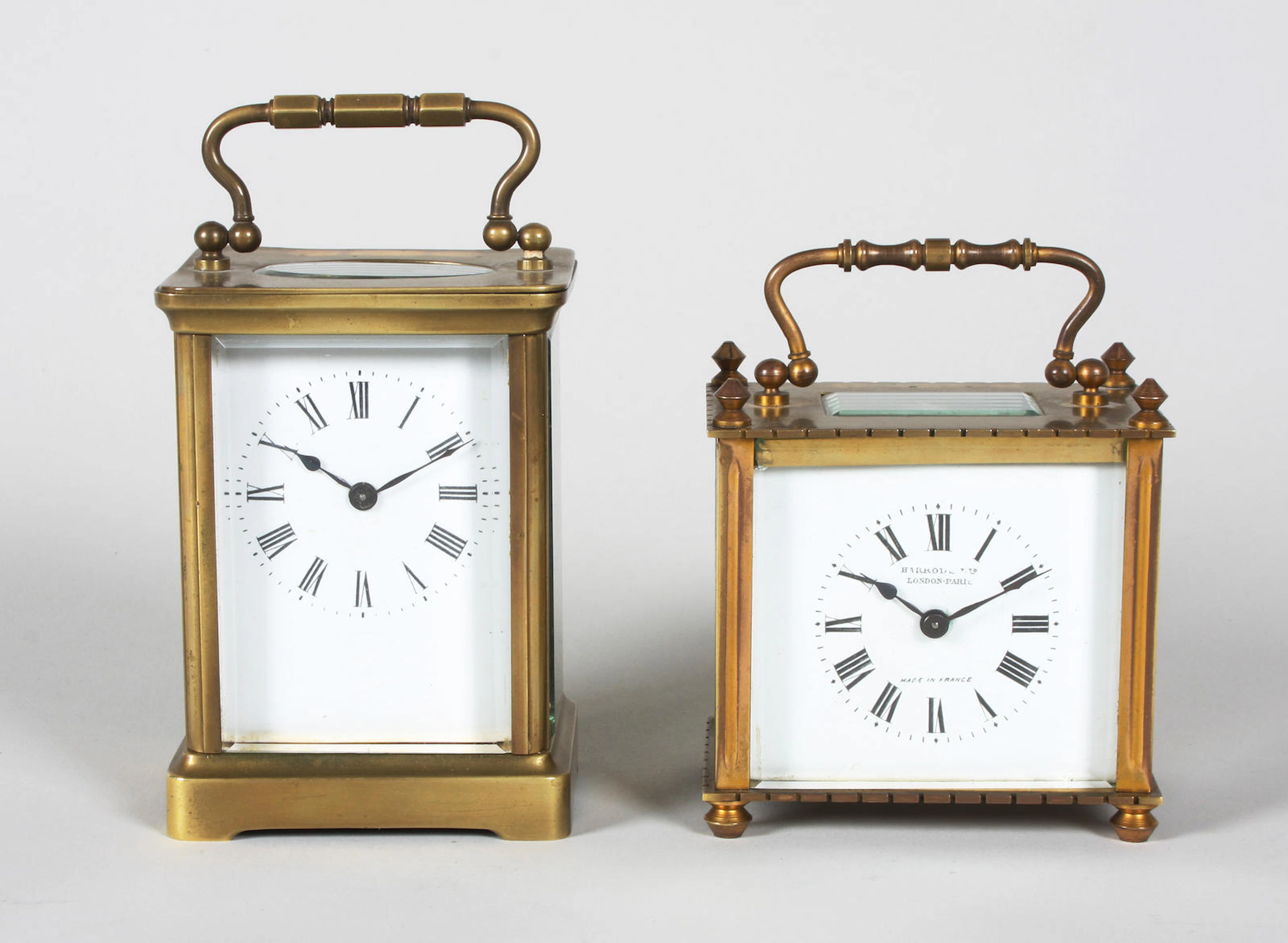 An early 20th century French brass and bevel glass Corniche cased carriage timepiece