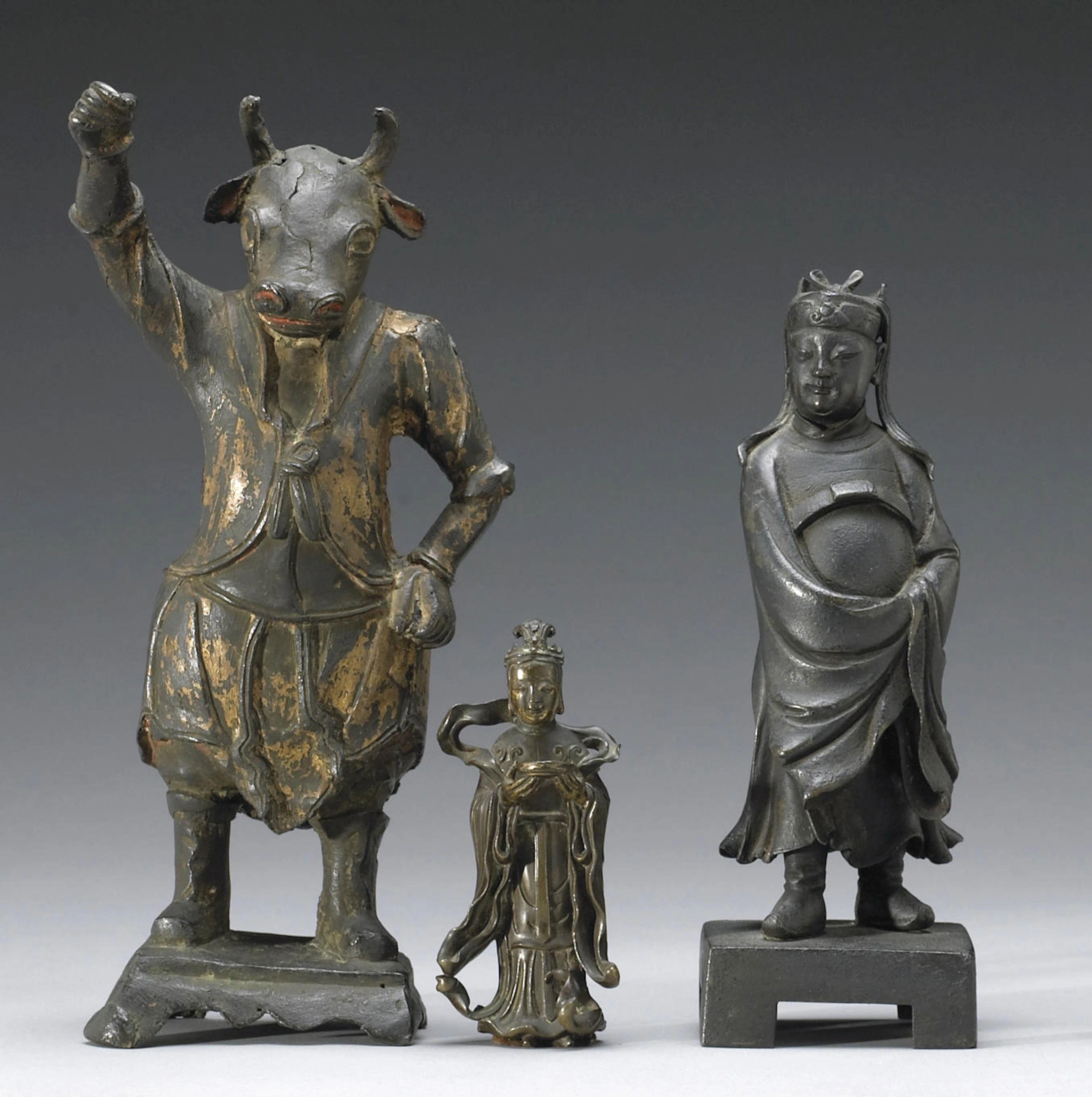 A group of three figural bronzes 17th and 18th Centuries