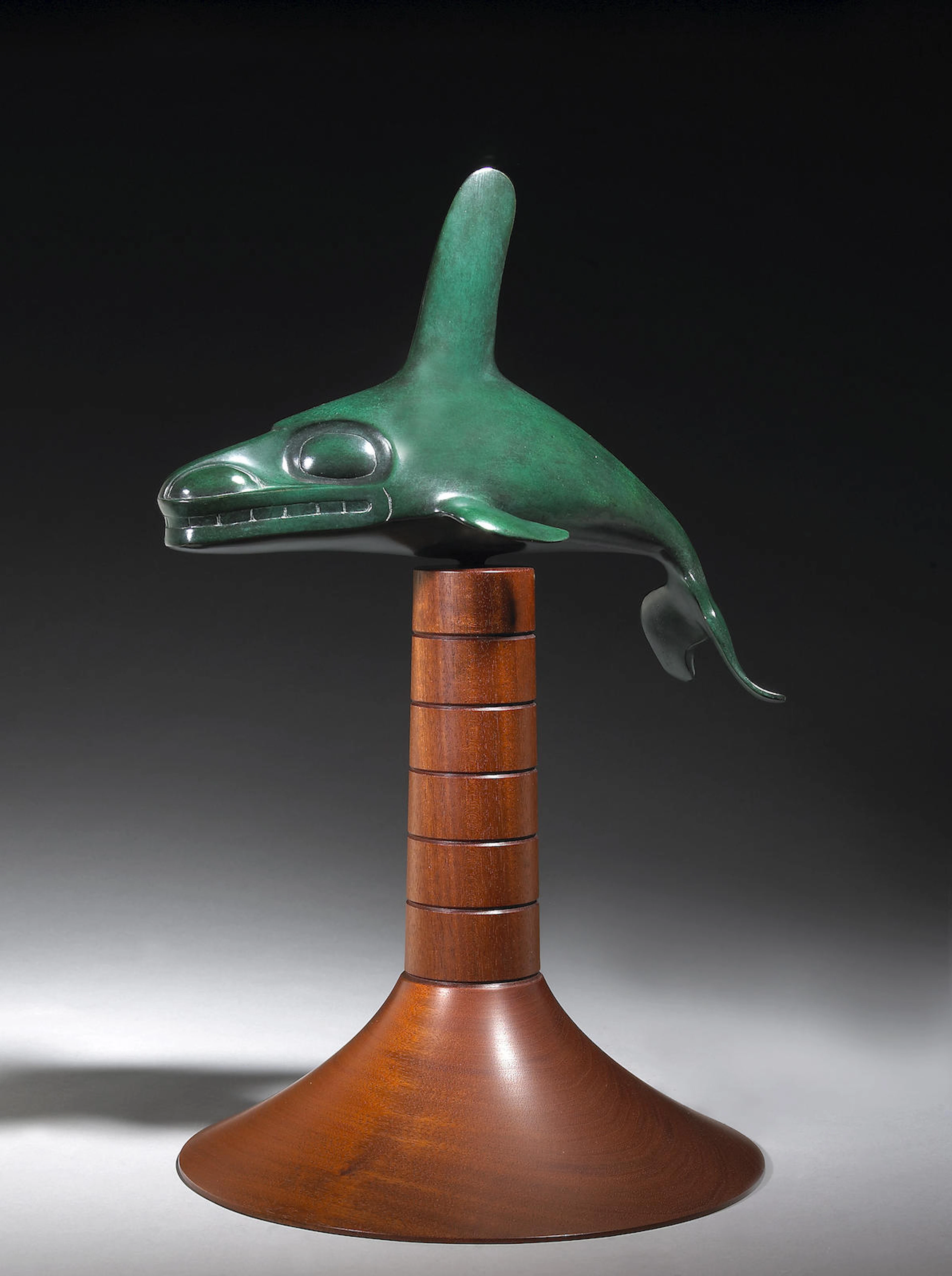 A Haida bronze and wood sculpture, Bill Reid