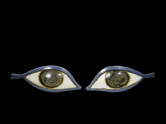 A pair of Egyptian glass eye inlays