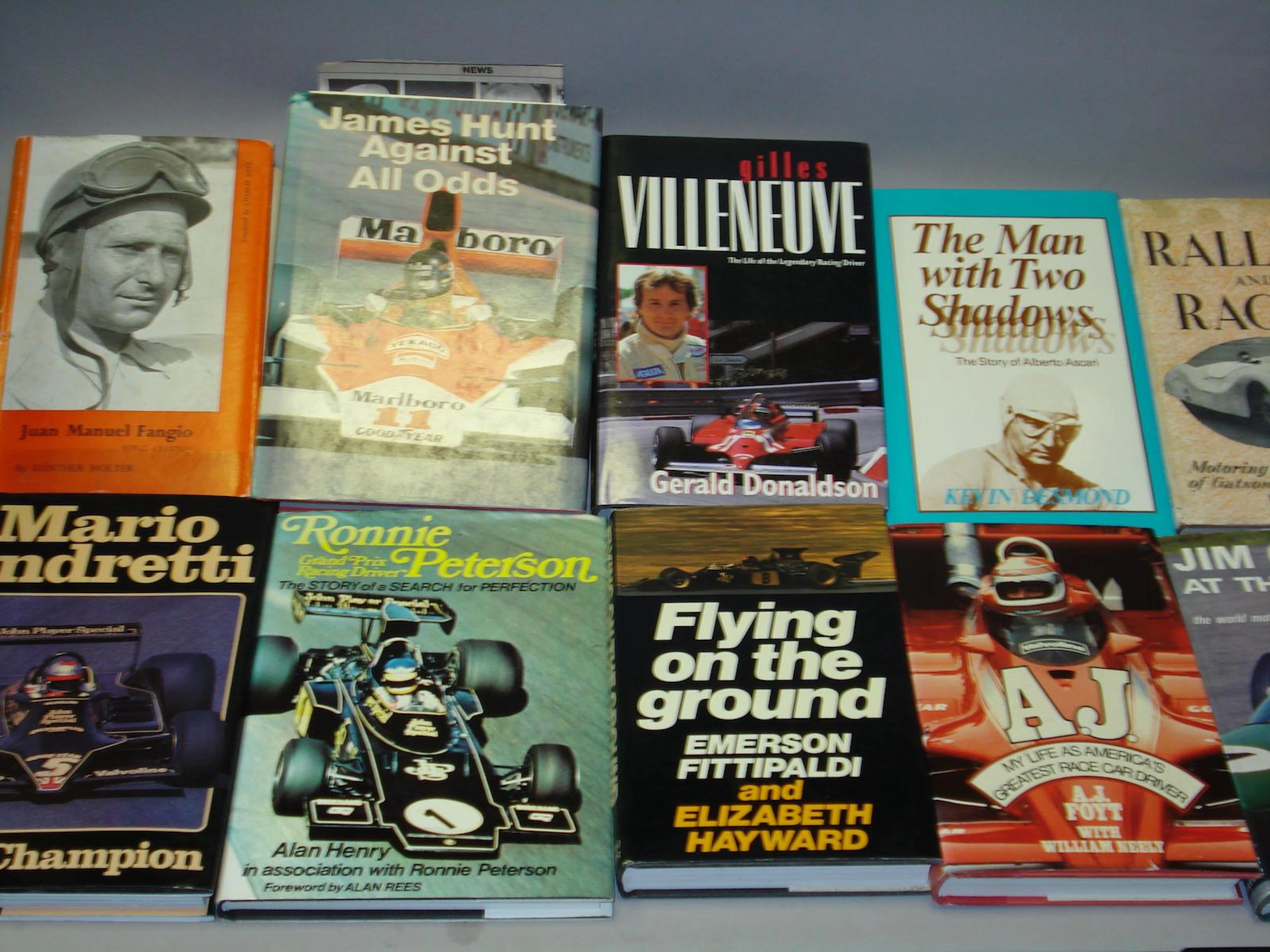 A lot of racing driver biographies,