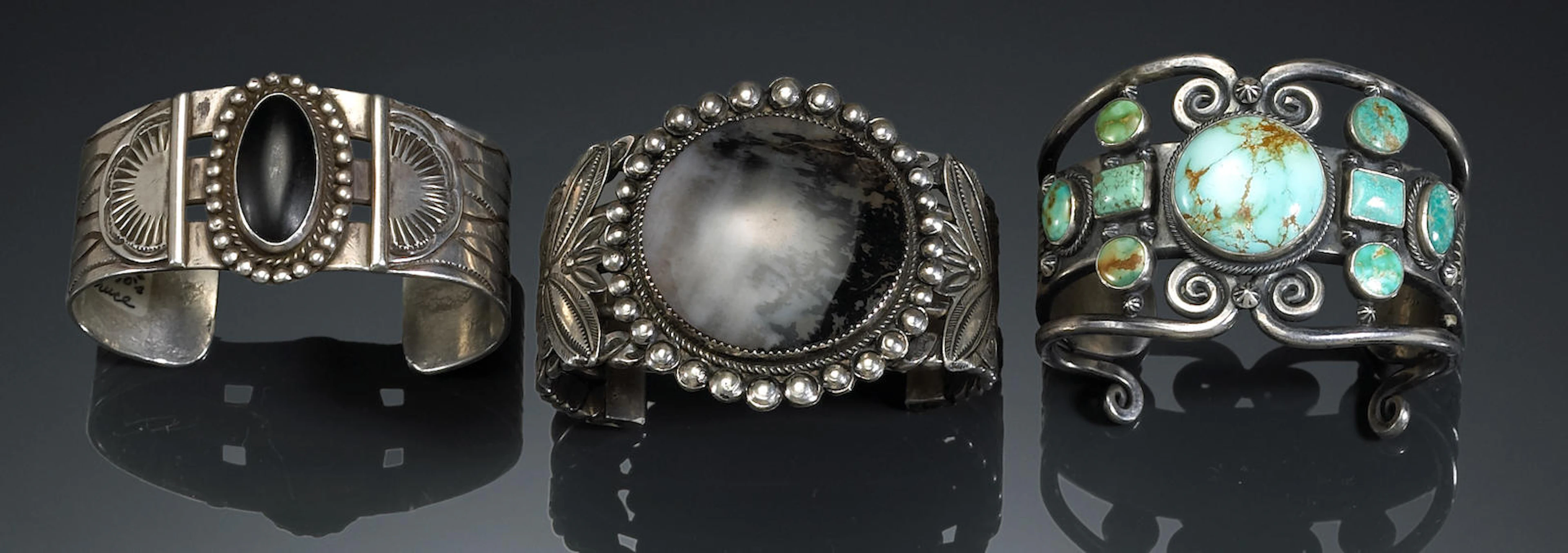 Three Navajo bracelets