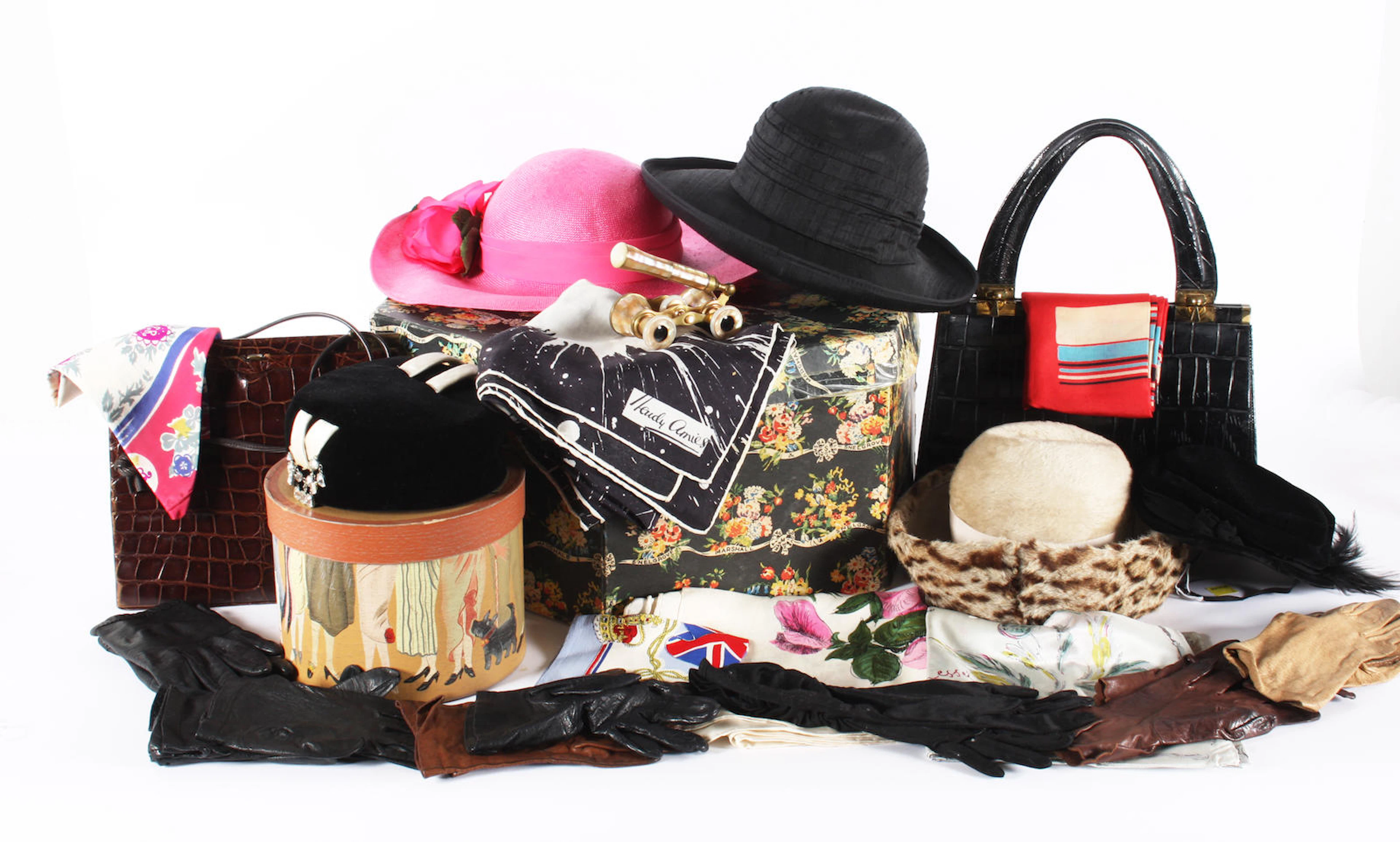 A group of bags, hats and other accessories