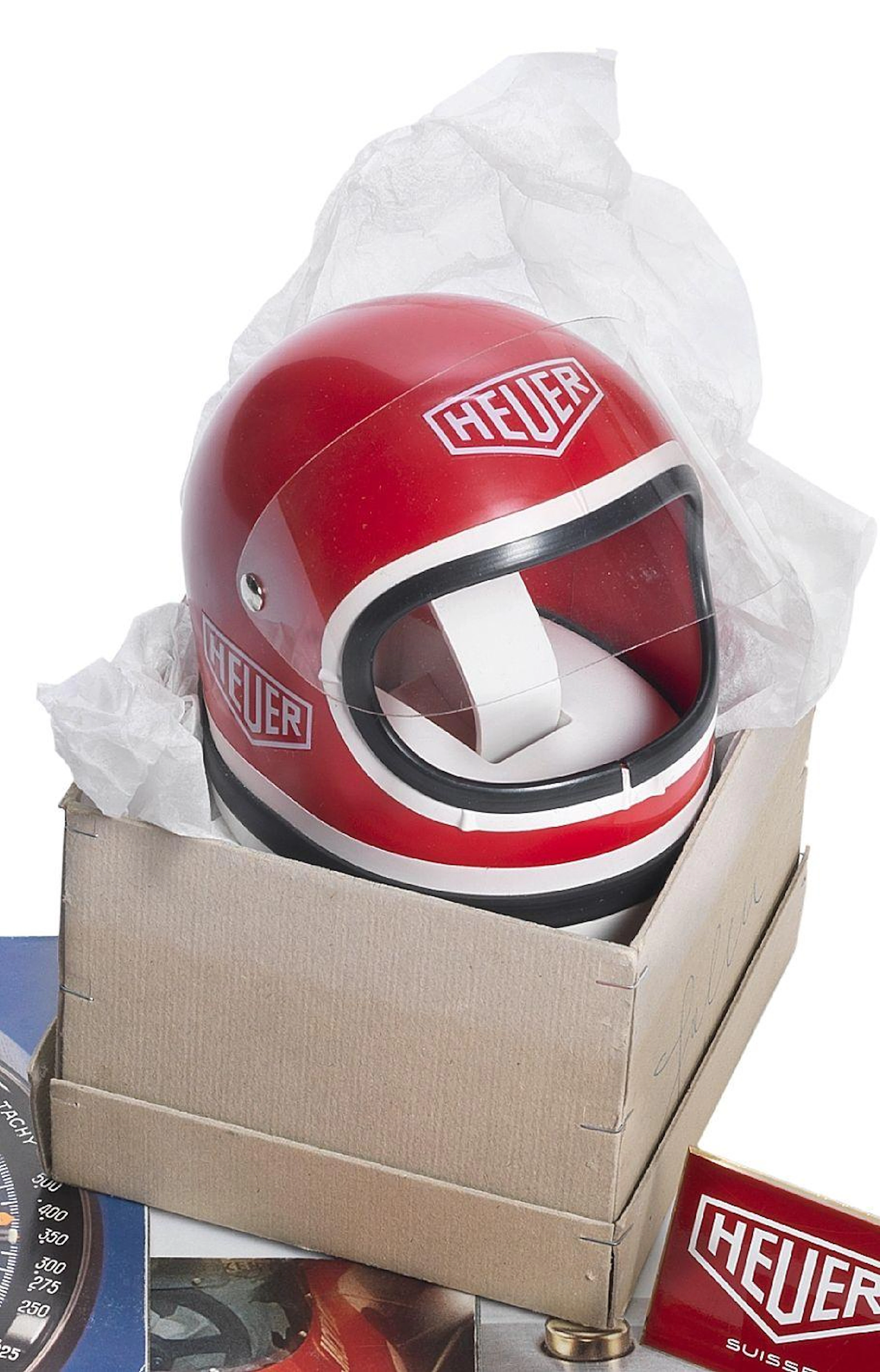 A rare Heuer Helmet watch display box in original packaging