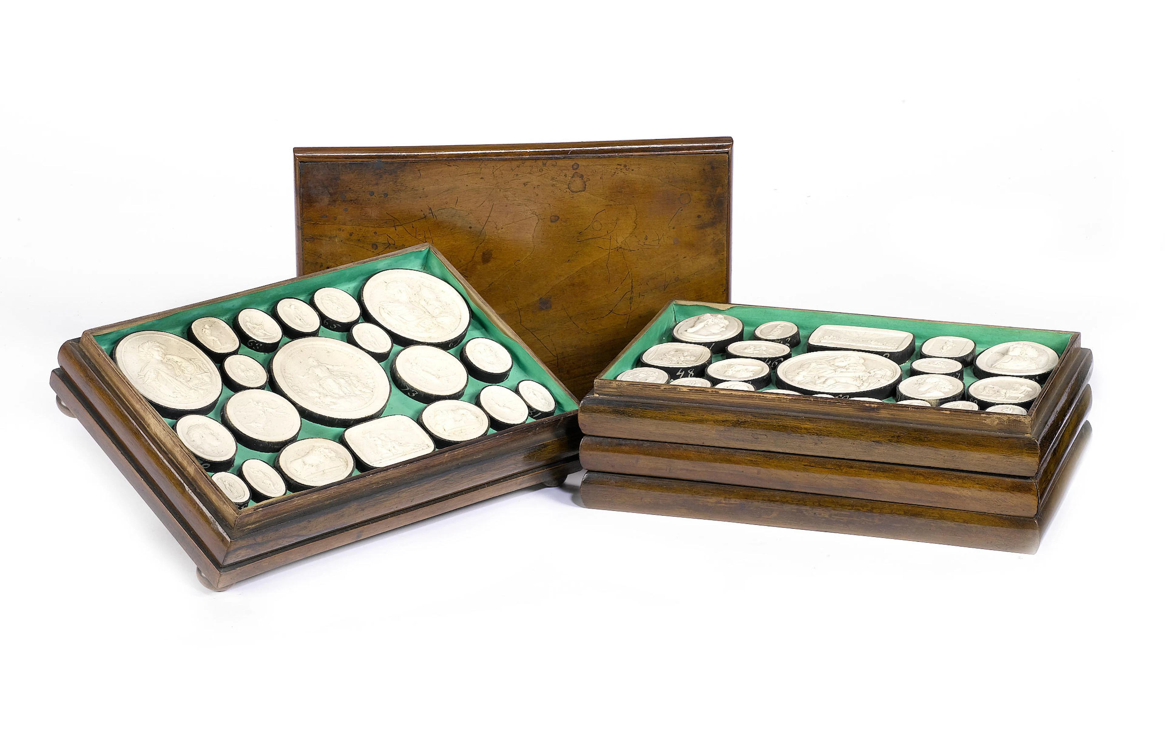 A boxed set of 19th century Italian Grand Tour plaster intaglios by Giovanni Liberotti