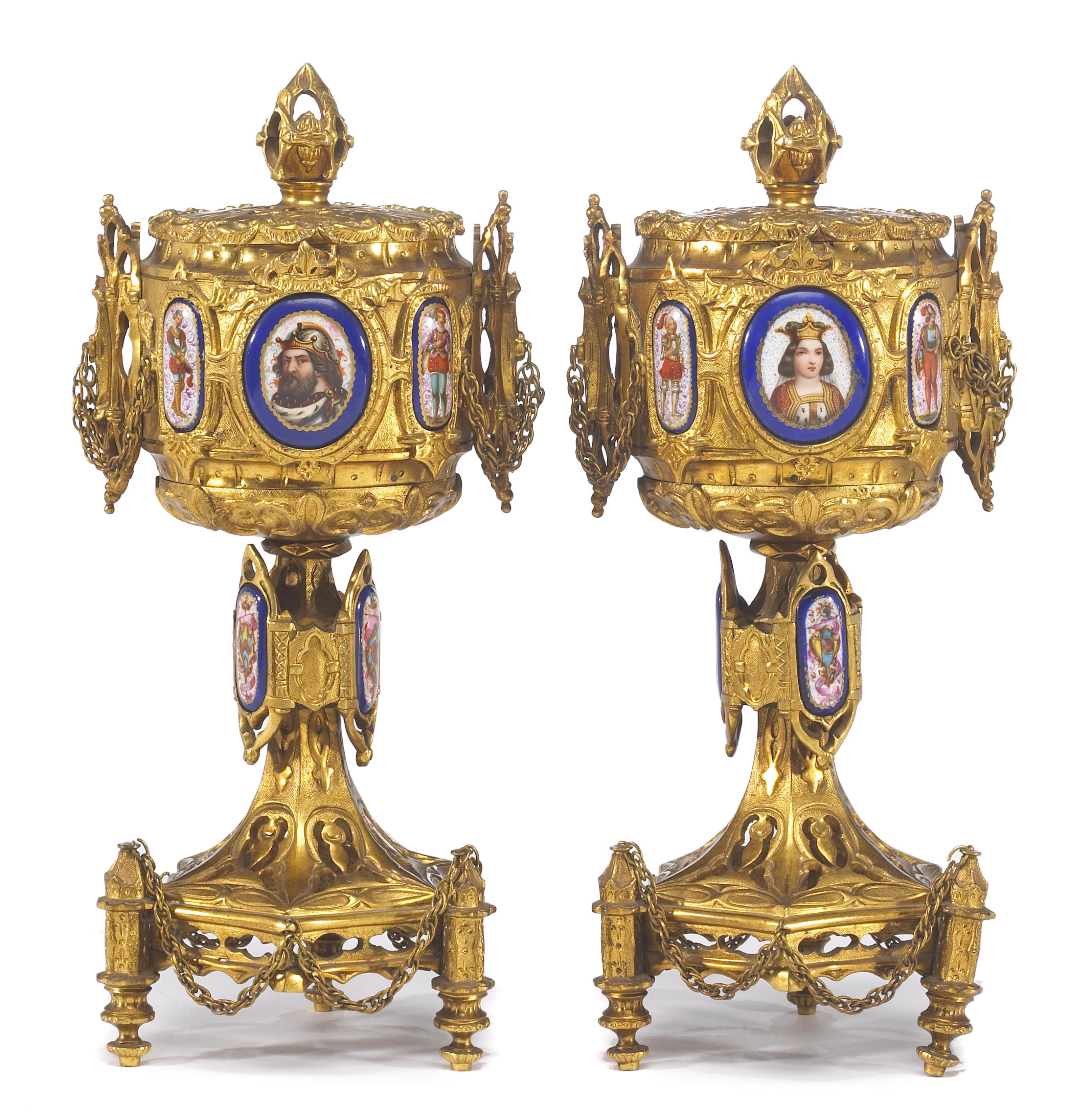 A pair of French Gothic Revival gilt bronze and porcelain inset covered urns