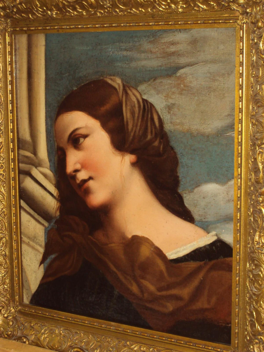 After Titian (Tiziano Vecelli) Study of a young lady, possibly a detail from an altar piece