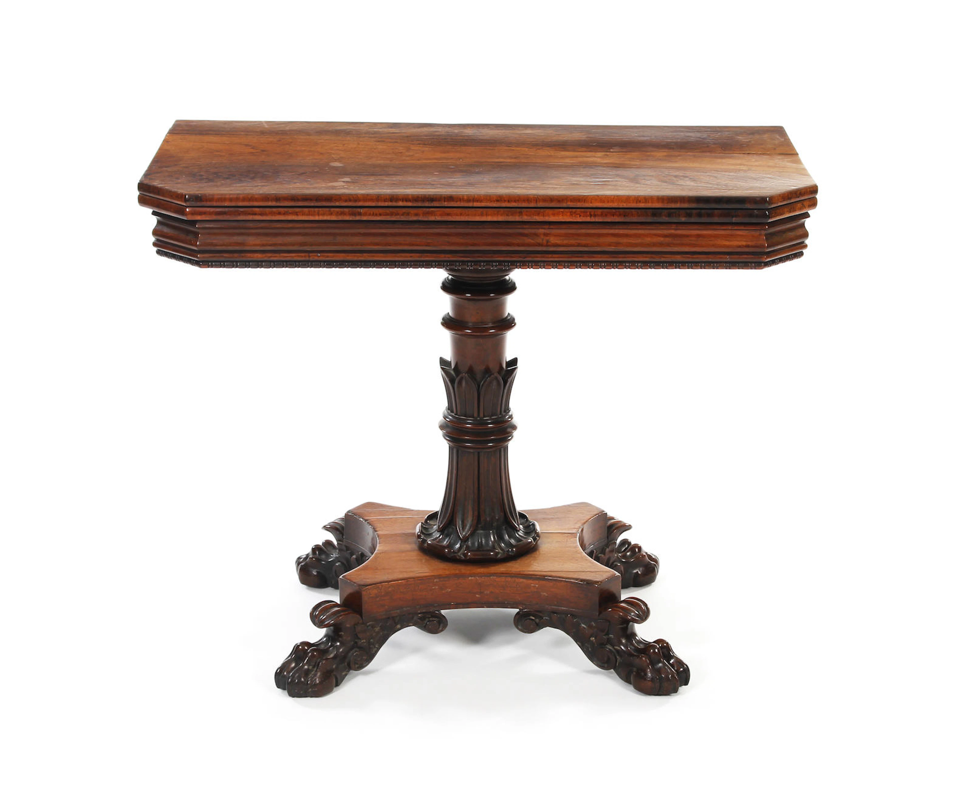A George IV rosewood fold-over pedestal tea table In the manner of Gillows