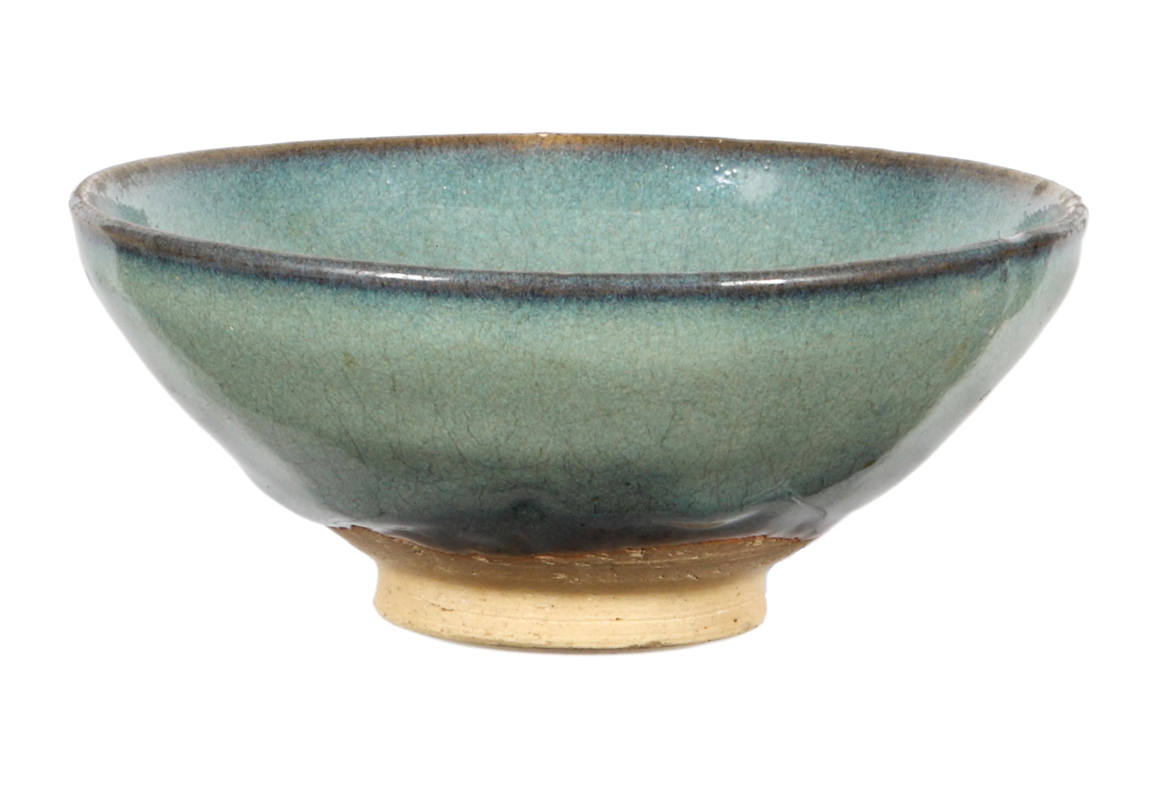 A Jum ware blue-green glazed pottery bowlSong DynastyThe base unglazed and having painted marks under the foot rim, 18cm diameter. 18cm diameter.