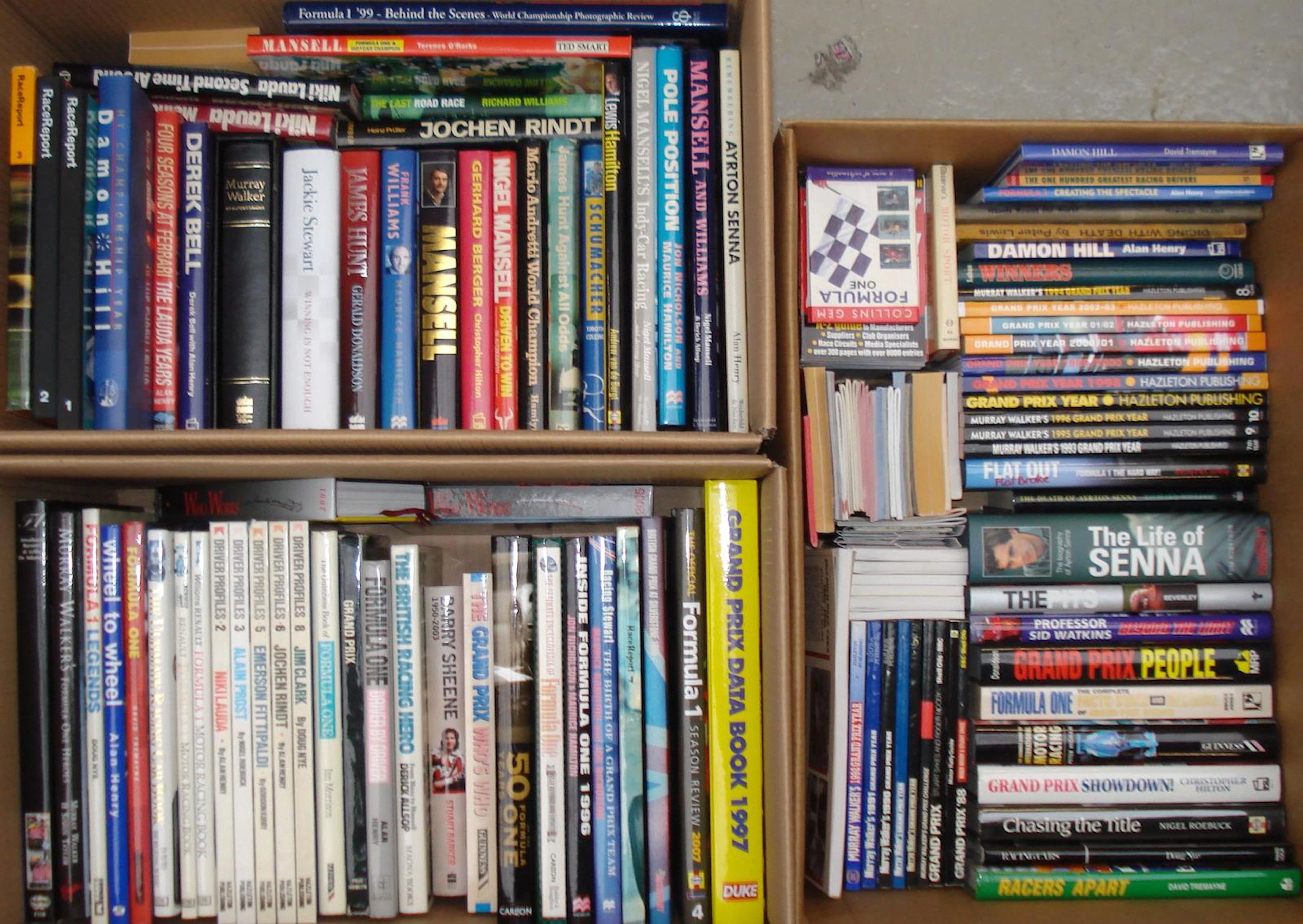 A quantity of F1 driver biographies and reference books,