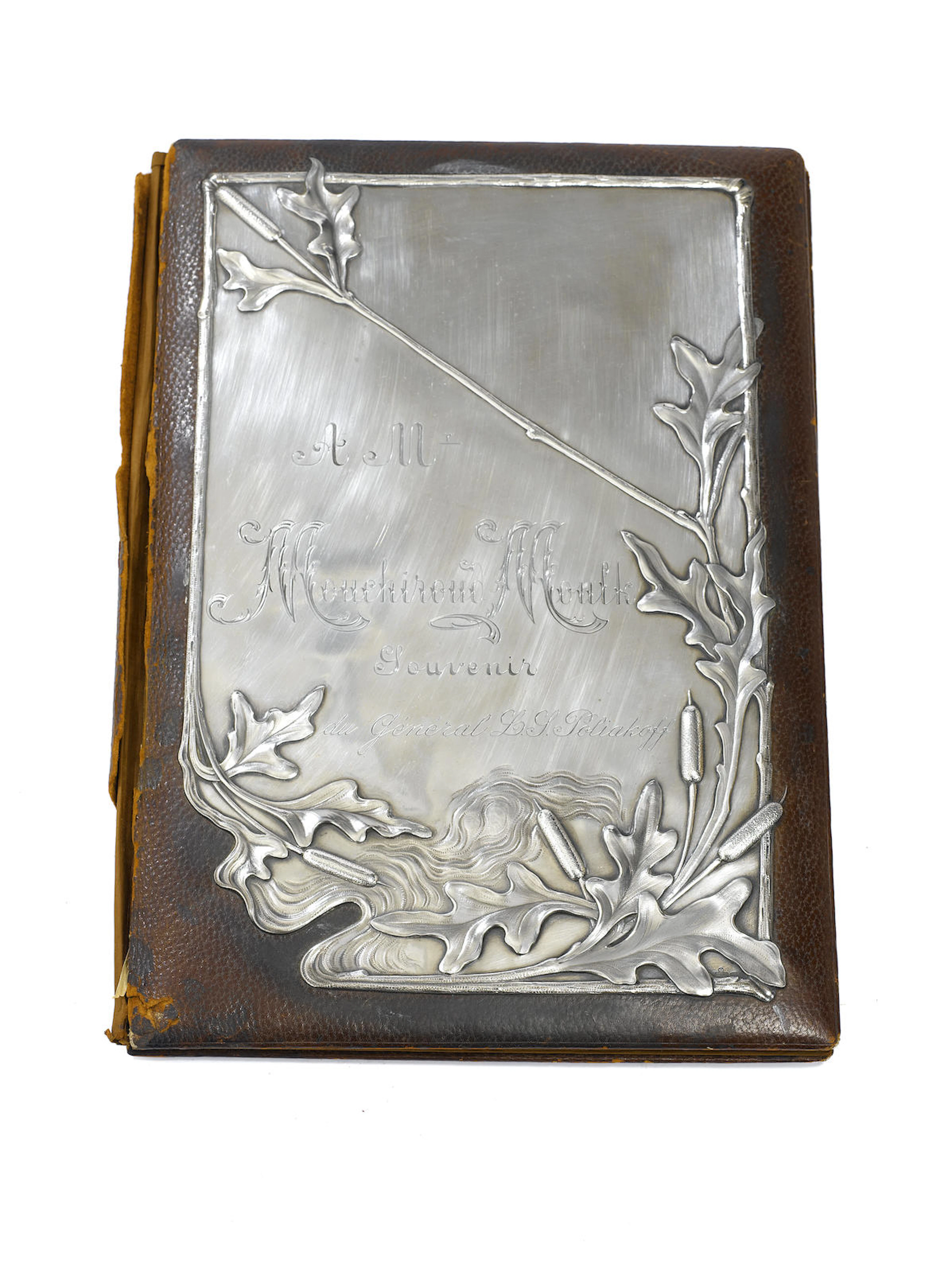 A Russian Art Nouveau silver mounted leather folioFabergé, Moscow, 1898-1908