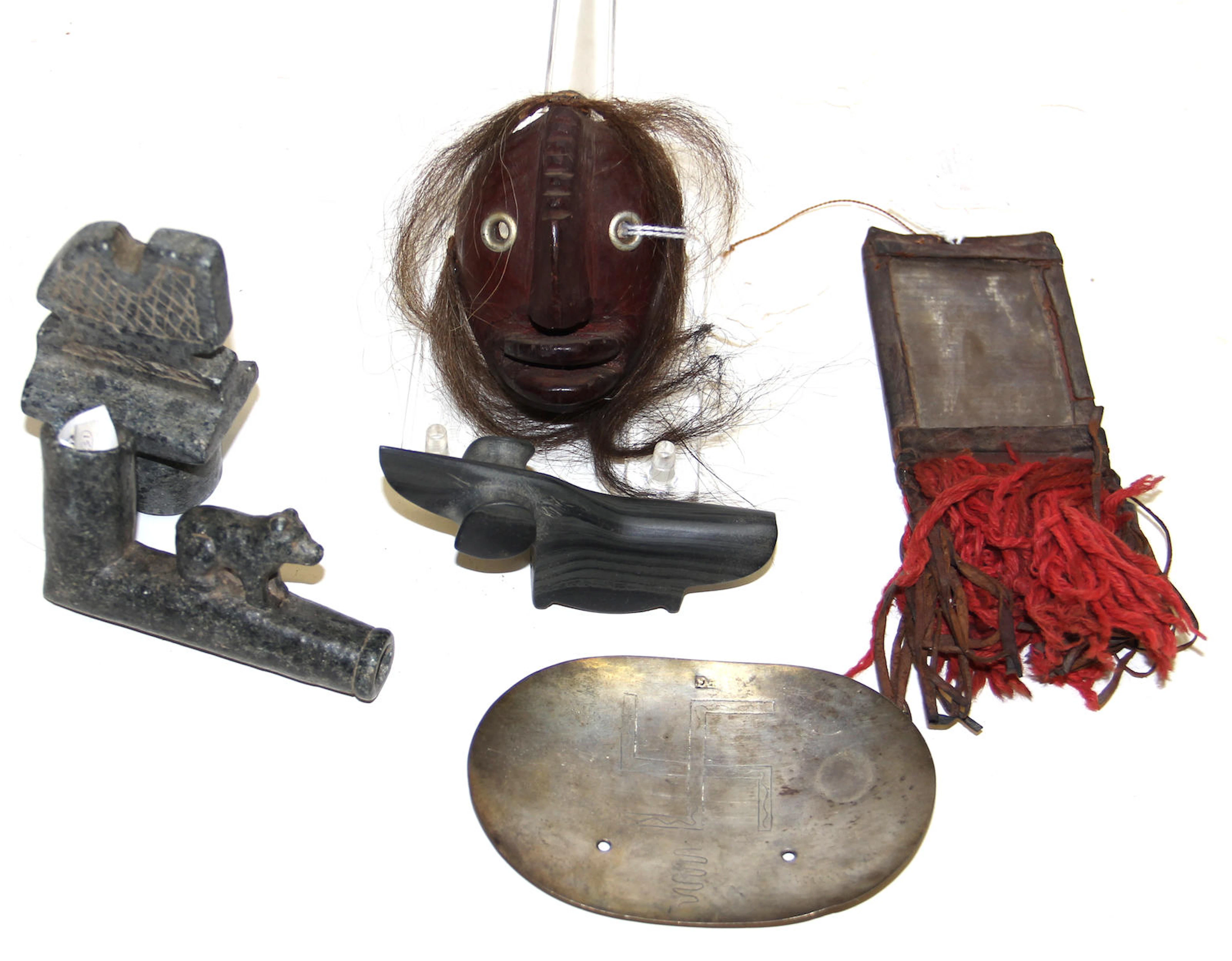 Six Native American or ethnic artifacts