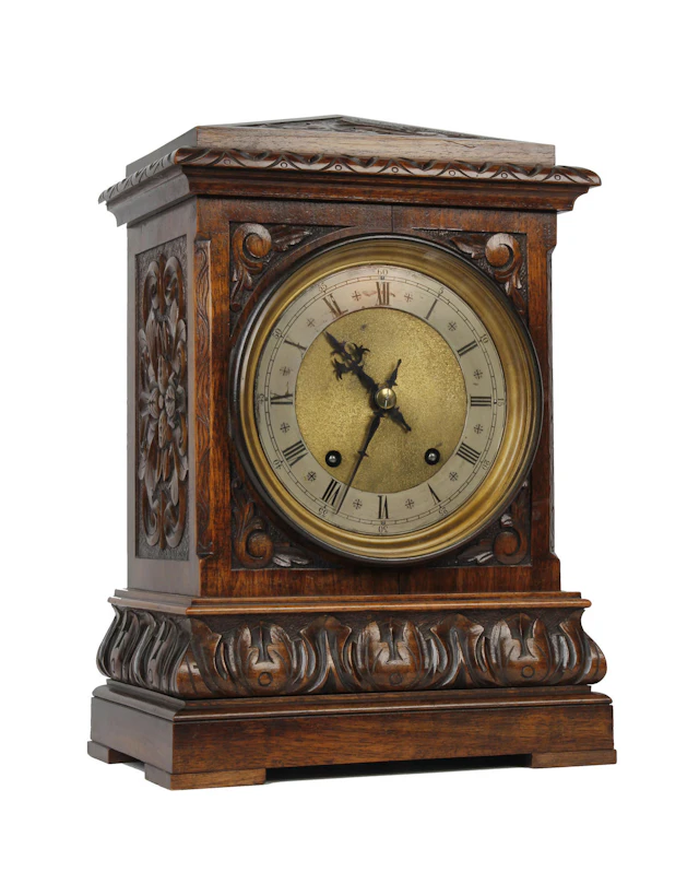 A 19th century 8-day carved oak bracket clock, and bracket W & B Sch