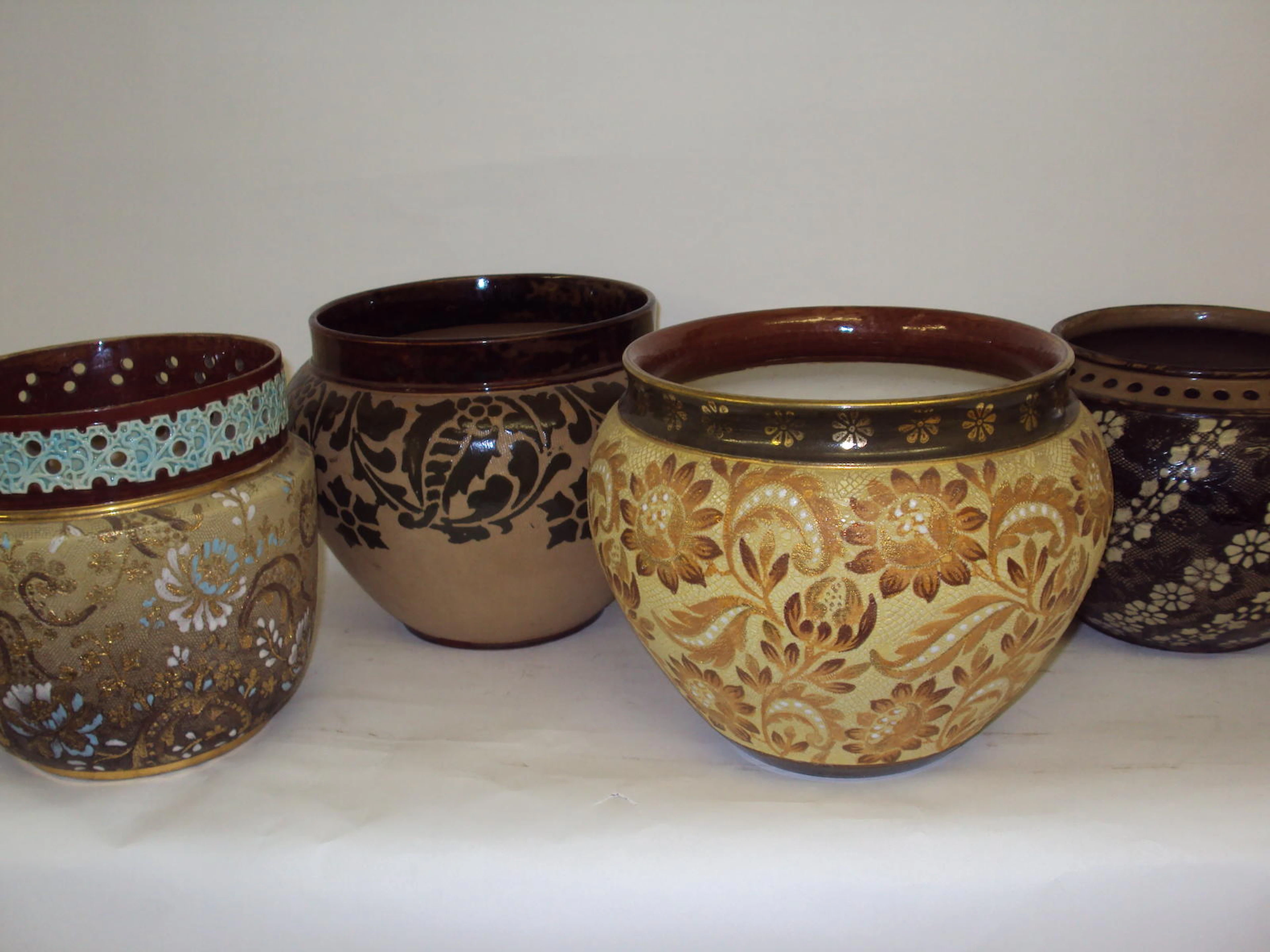 A small collection of Doulton Lambeth Slaters Patent jardinieres