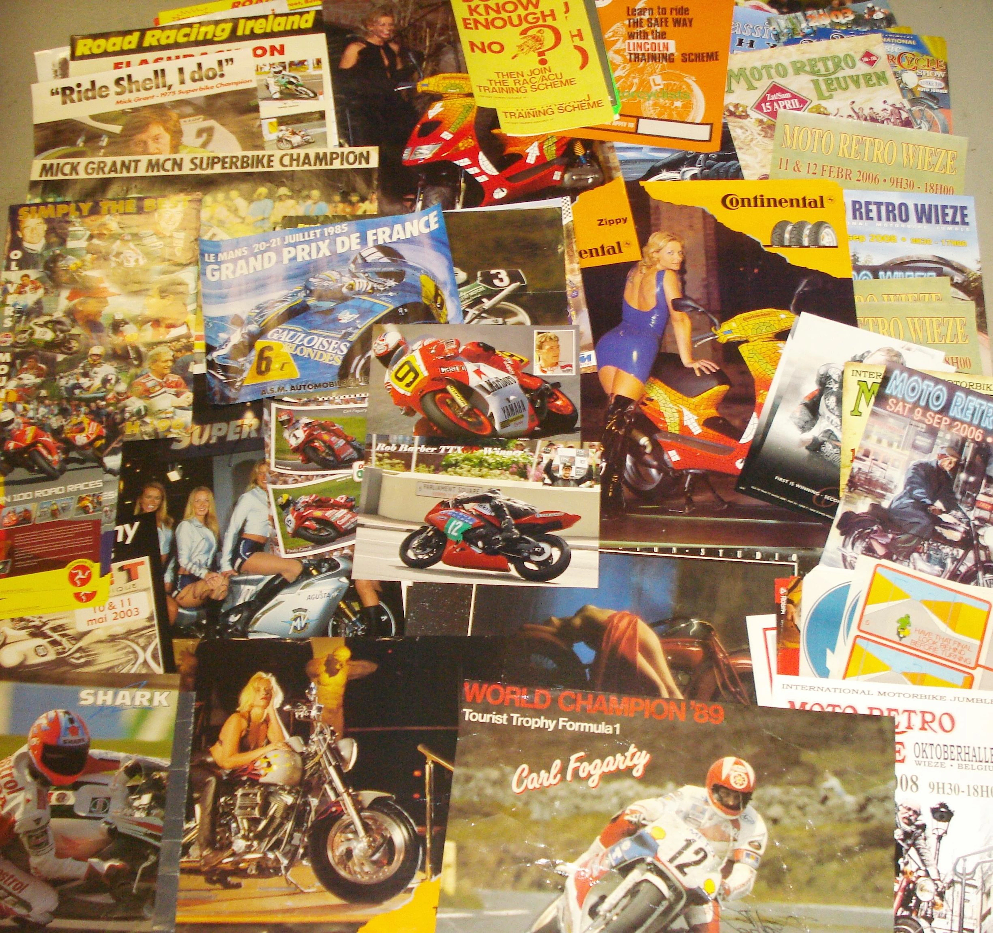 A quantity of assorted motorcycling posters,