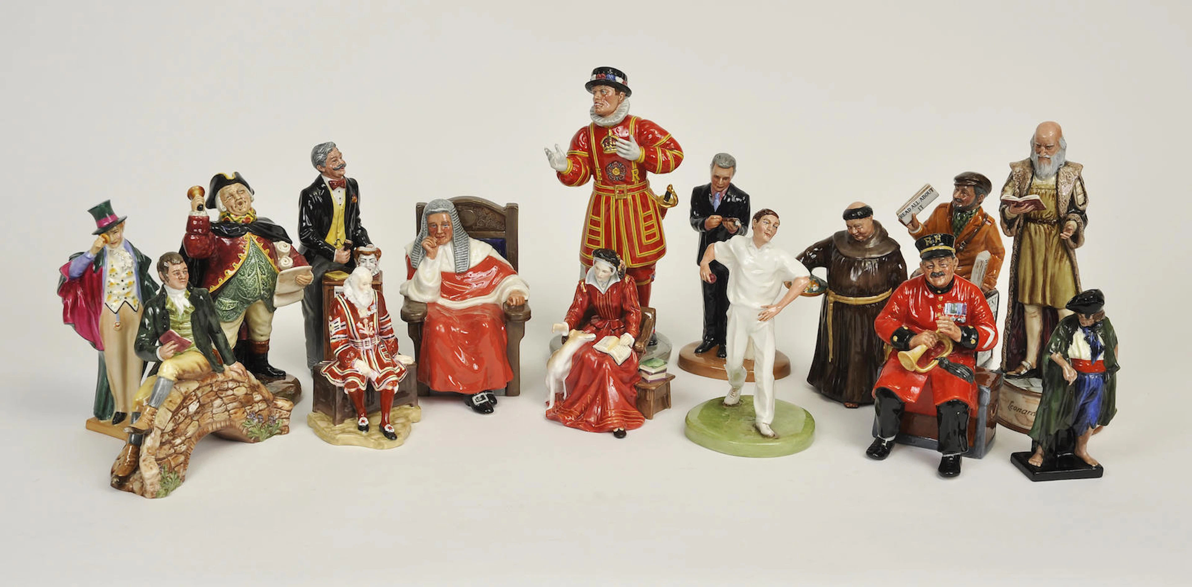 Fifteen Royal Doulton glazed earthenware figures or figural groups