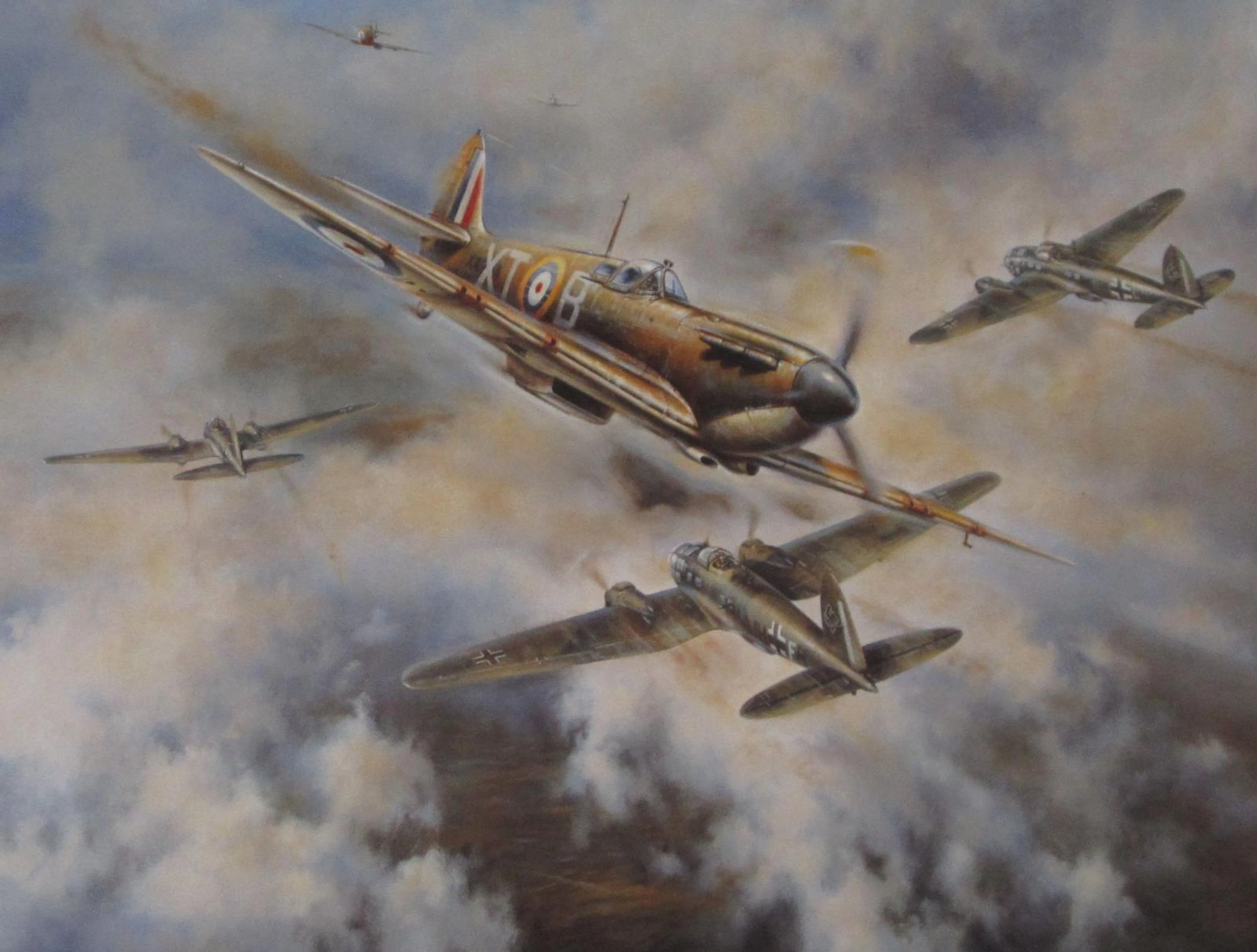 Three prints depicting Supermarine Spitfire fighter aircraft,
