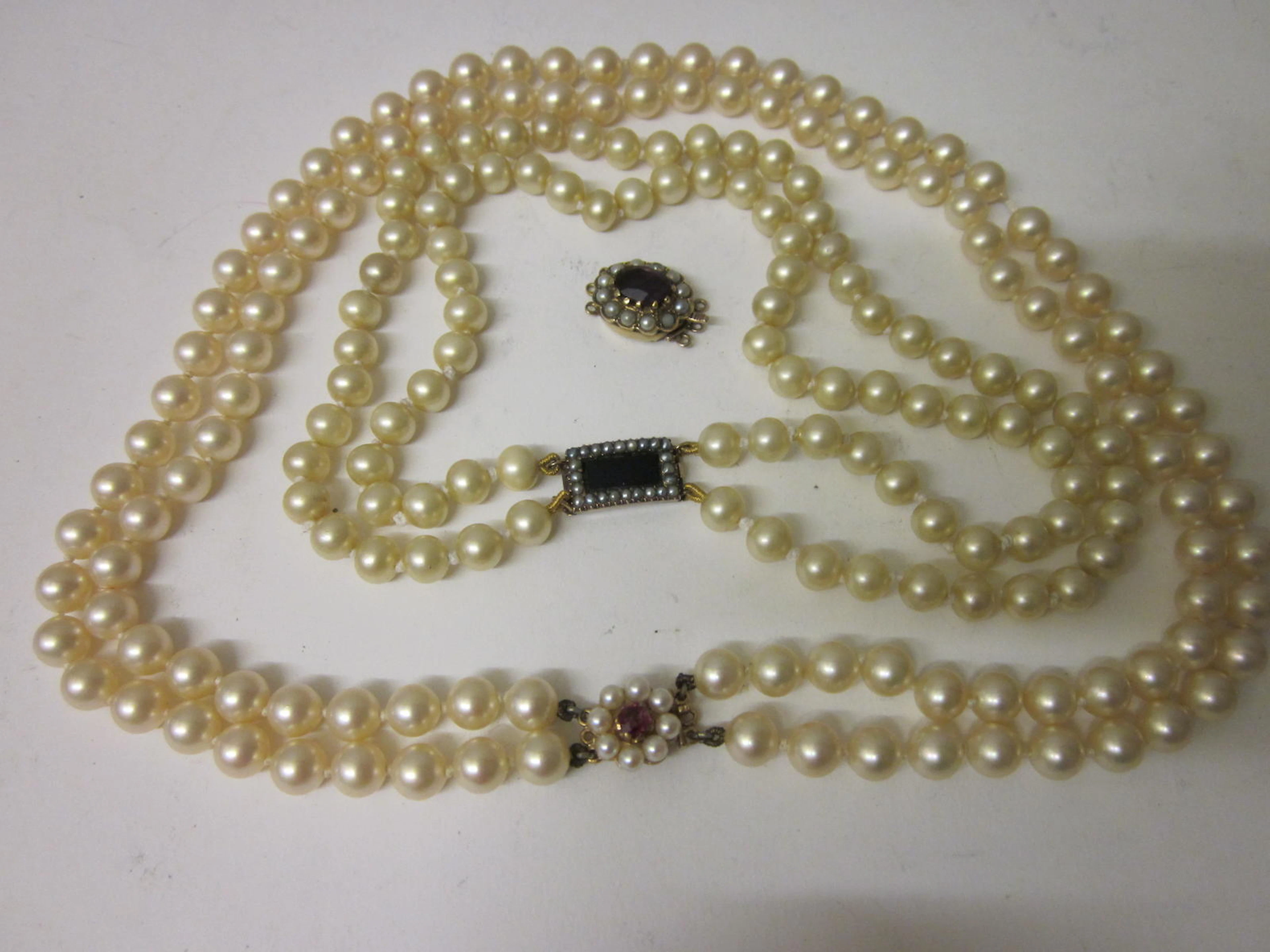 A two row uniform cultured pearl necklace, (3)