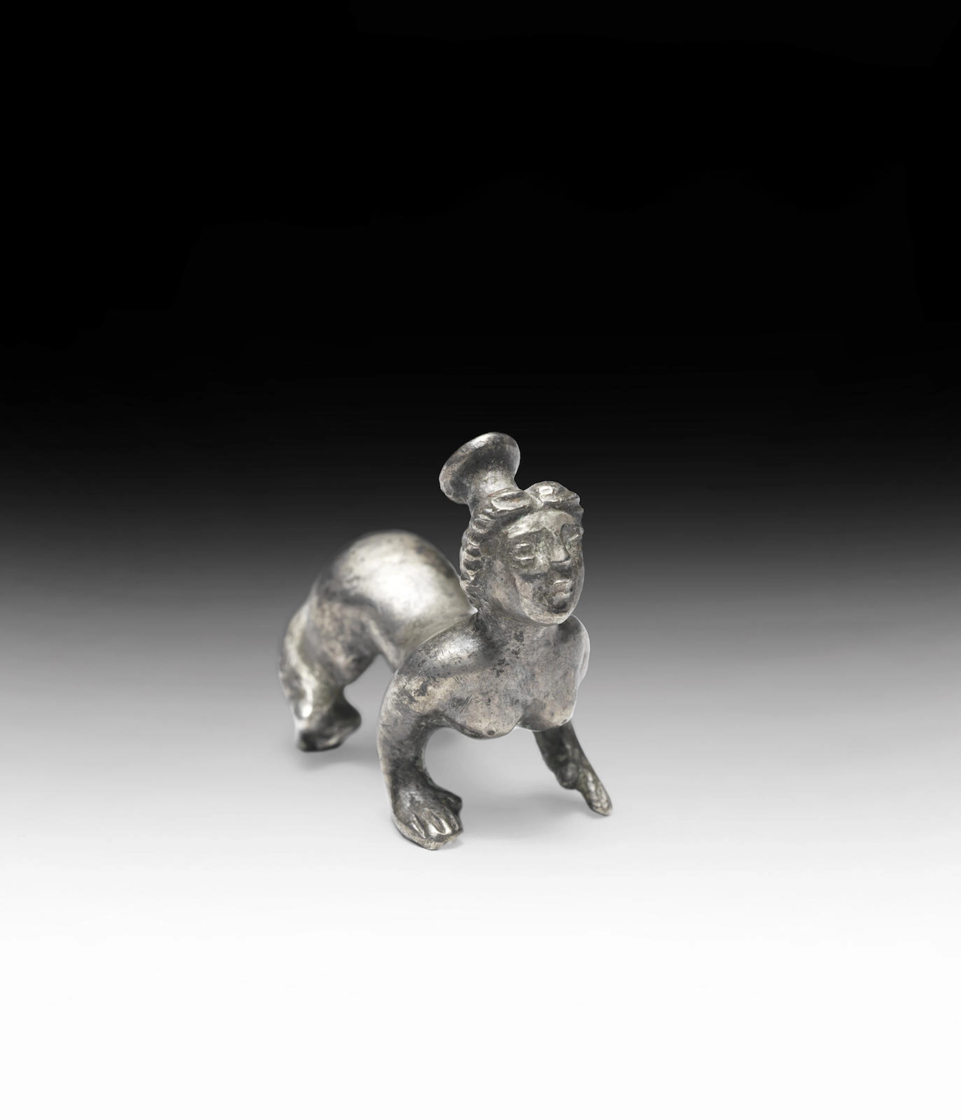 A small Roman silver figure