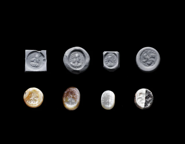 Four Sasanian banded agate stamp seals