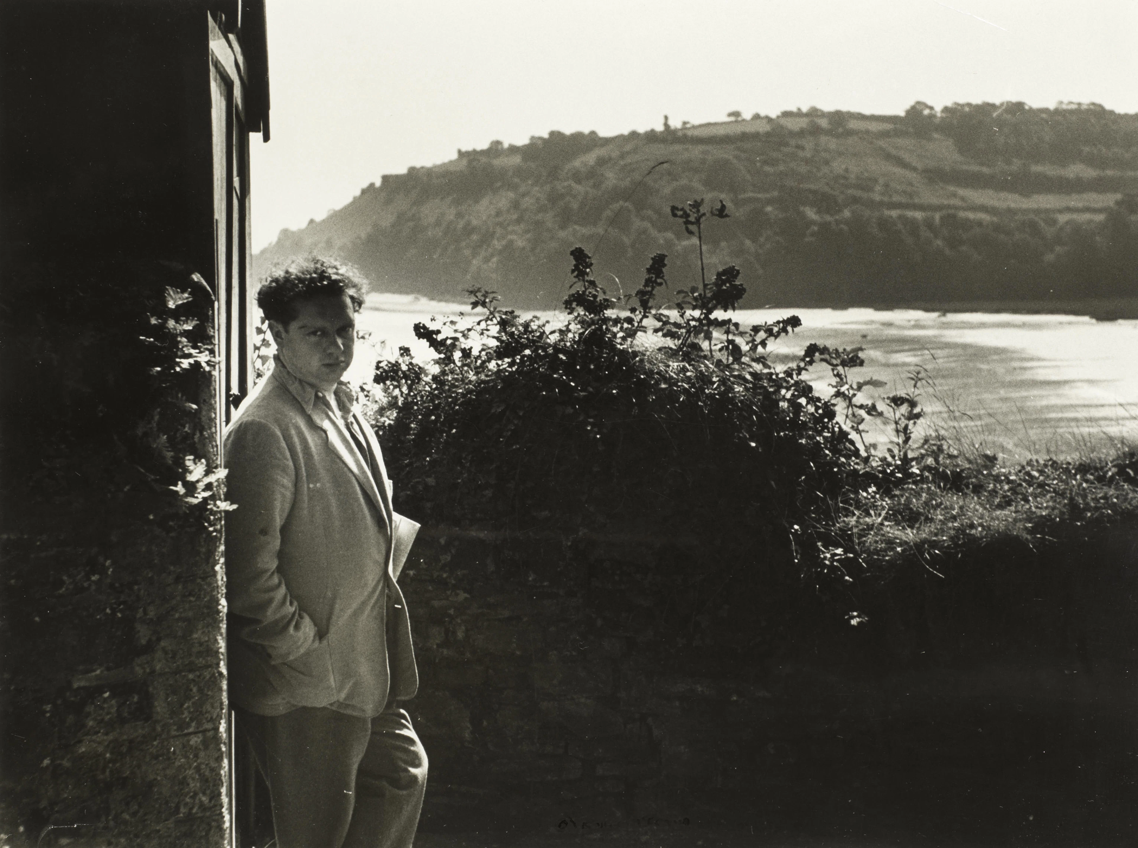 THOMAS, DYLAN, (1914-1953, Welsh poet), PORTRAIT BY ROLLIE MCKENNA, 1953