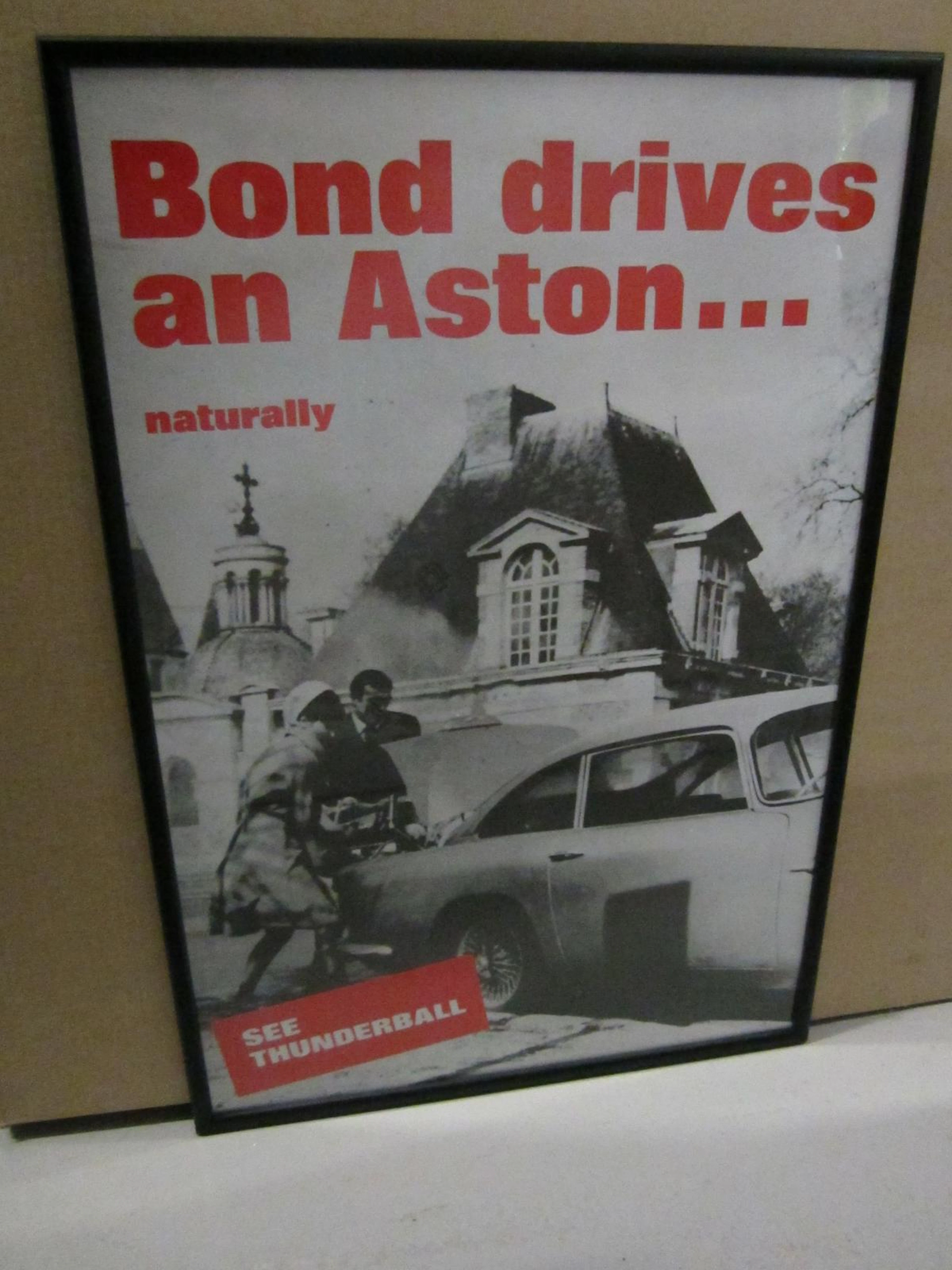 A 'Bond drives an Aston....naturally' poster for the film Thunderball,