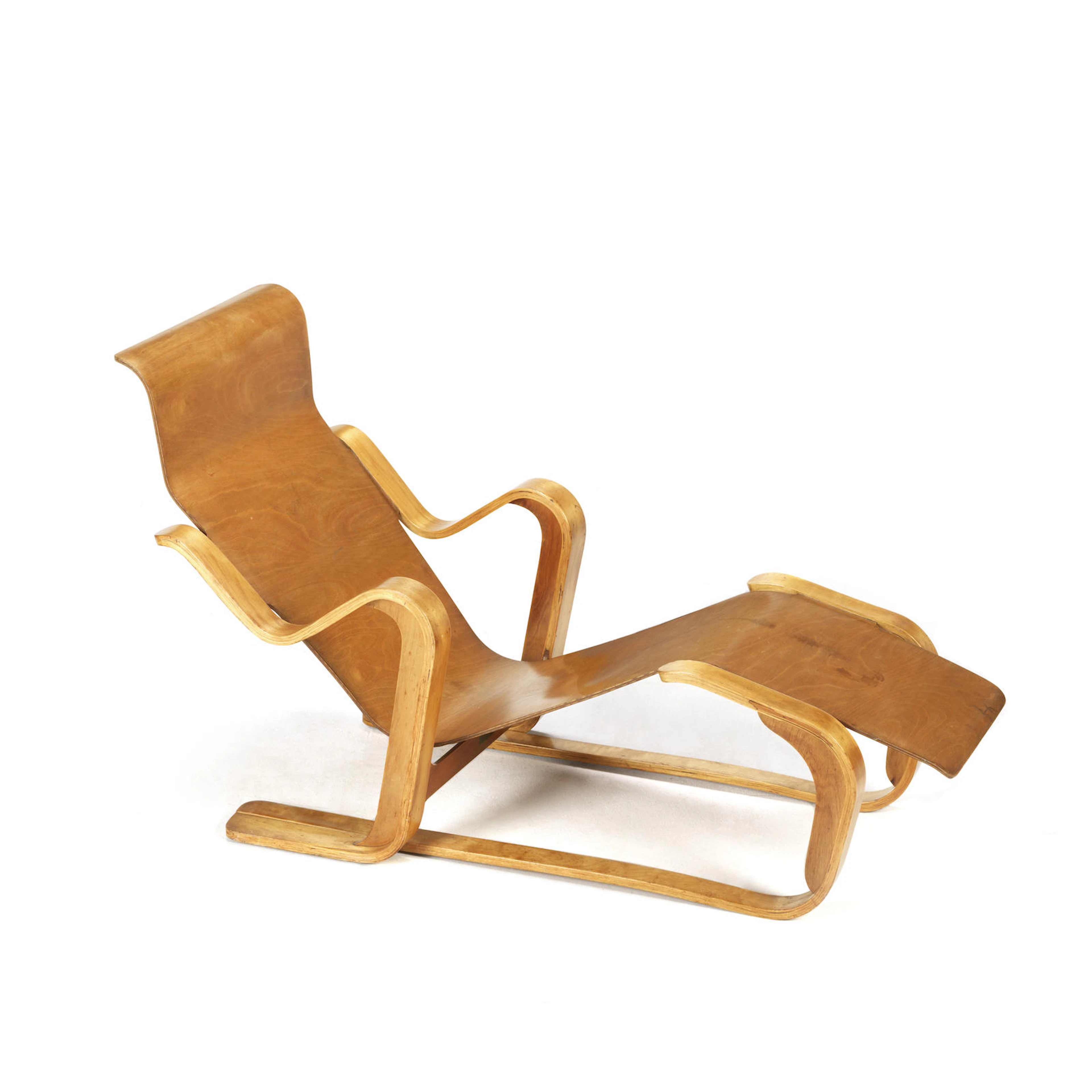 Marcel Breuer for Isokon Furniture Company A Long Chair designed and executed in 1936 paper label for Isokon Furniture Company, London, Isokon Long Chair birch faced moulded plywood Height: 75 cm. 29 