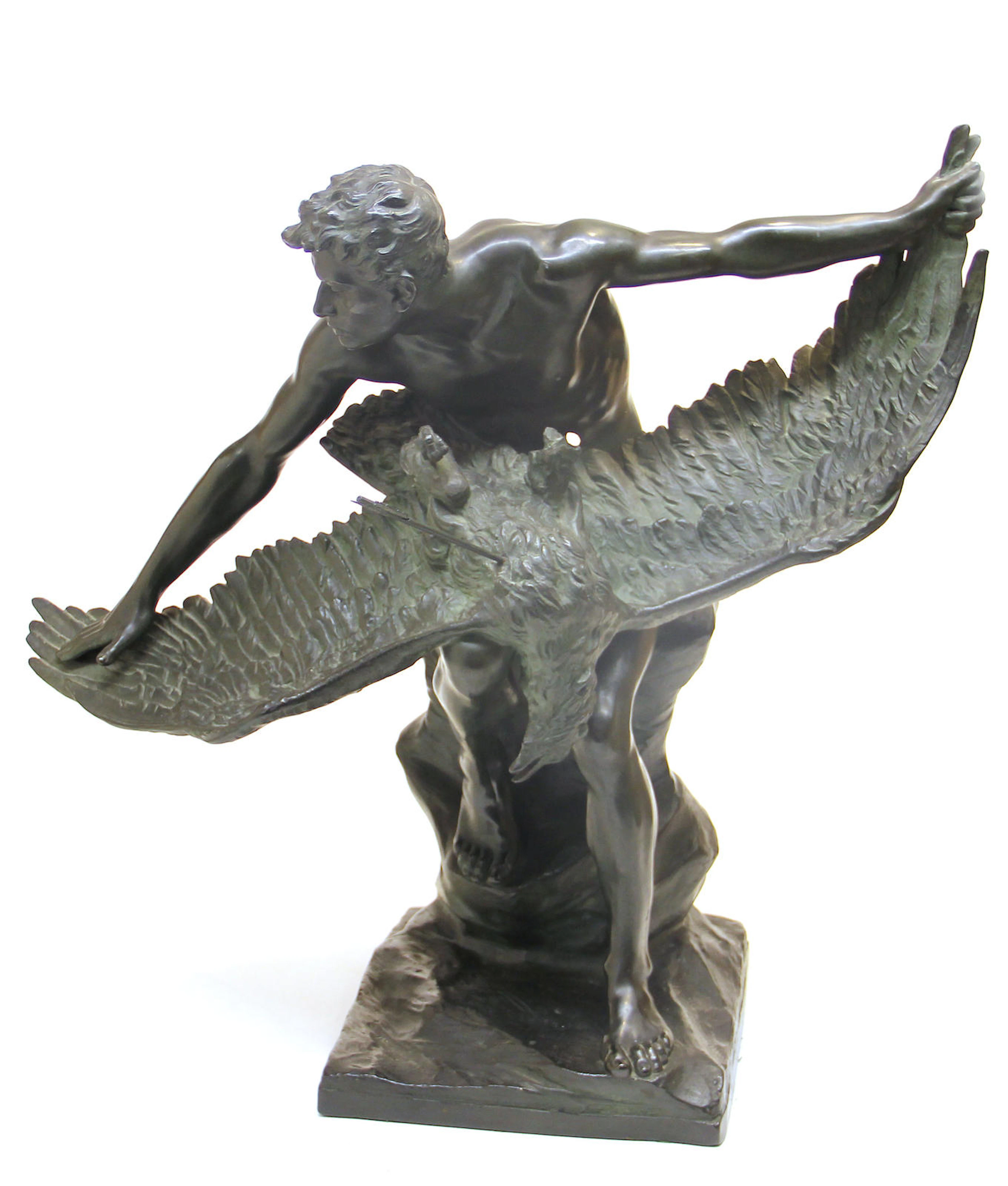 A German terracotta figural group with bronzed patination: Prometheus
