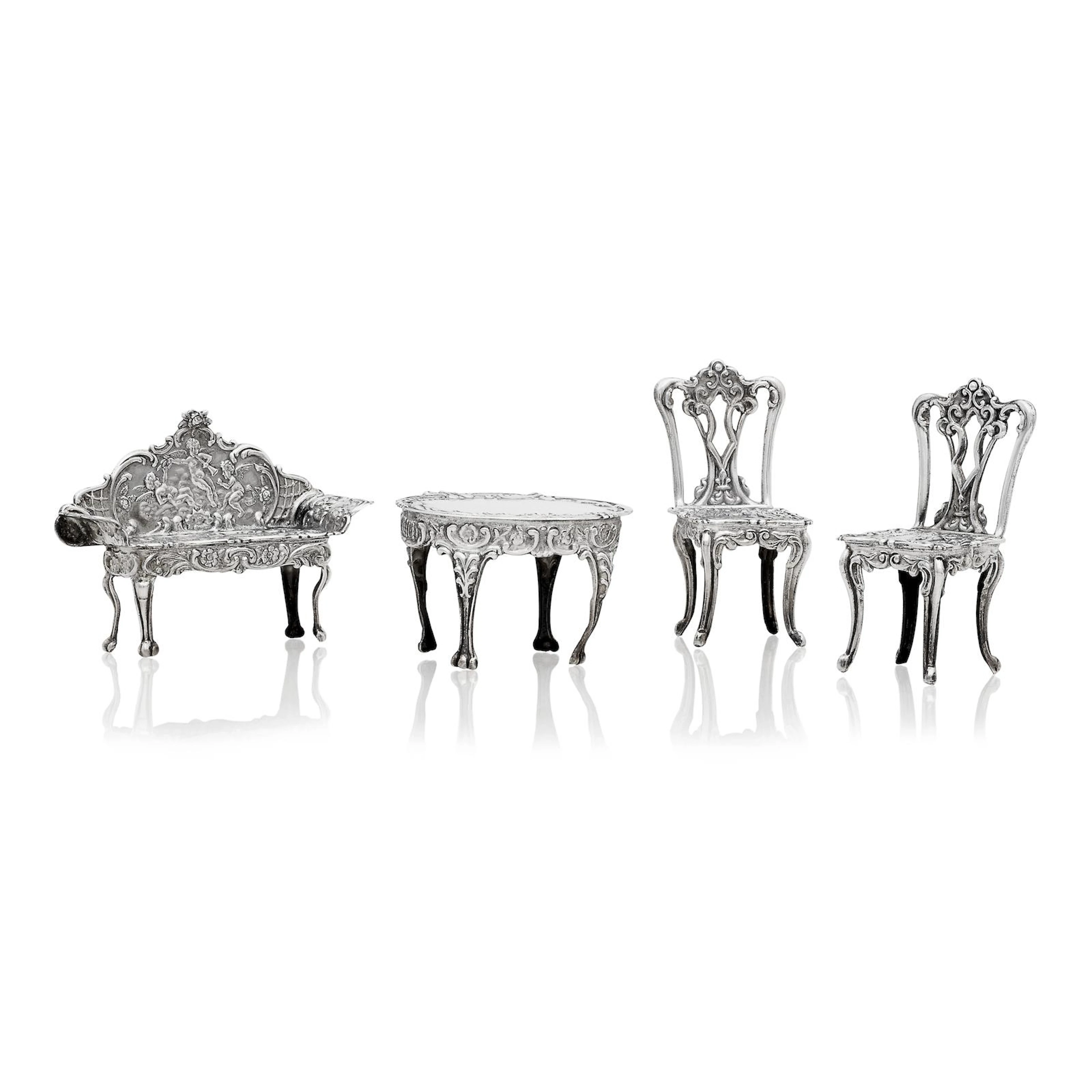 A miniature silver suite of furniture by David Hollander & Son, Birmingham 1976