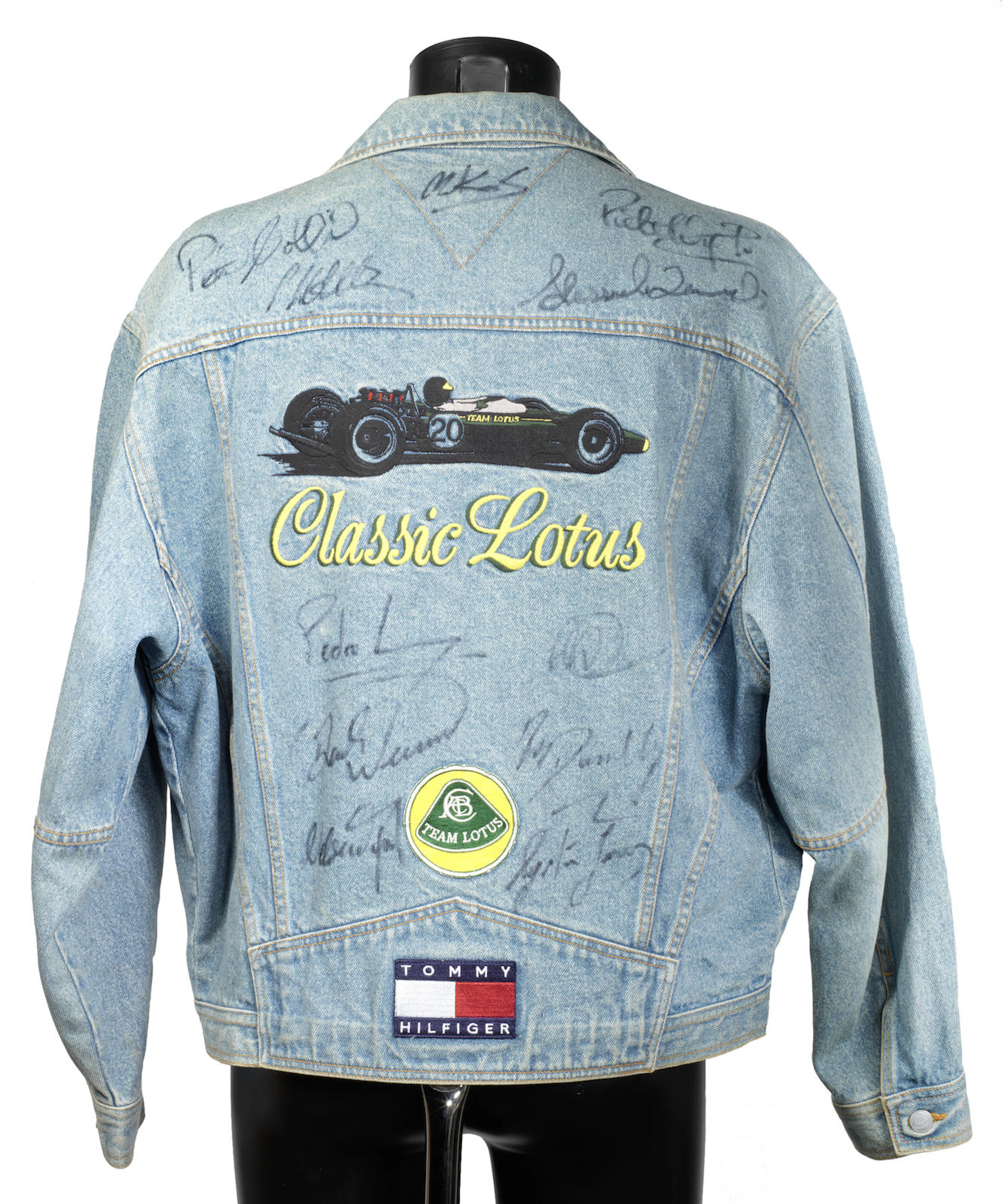 A circa 1993 Lotus F1 Team denim jacket by Tommy Hilfiger, signed by various drivers and team members including Ayrton Senna,