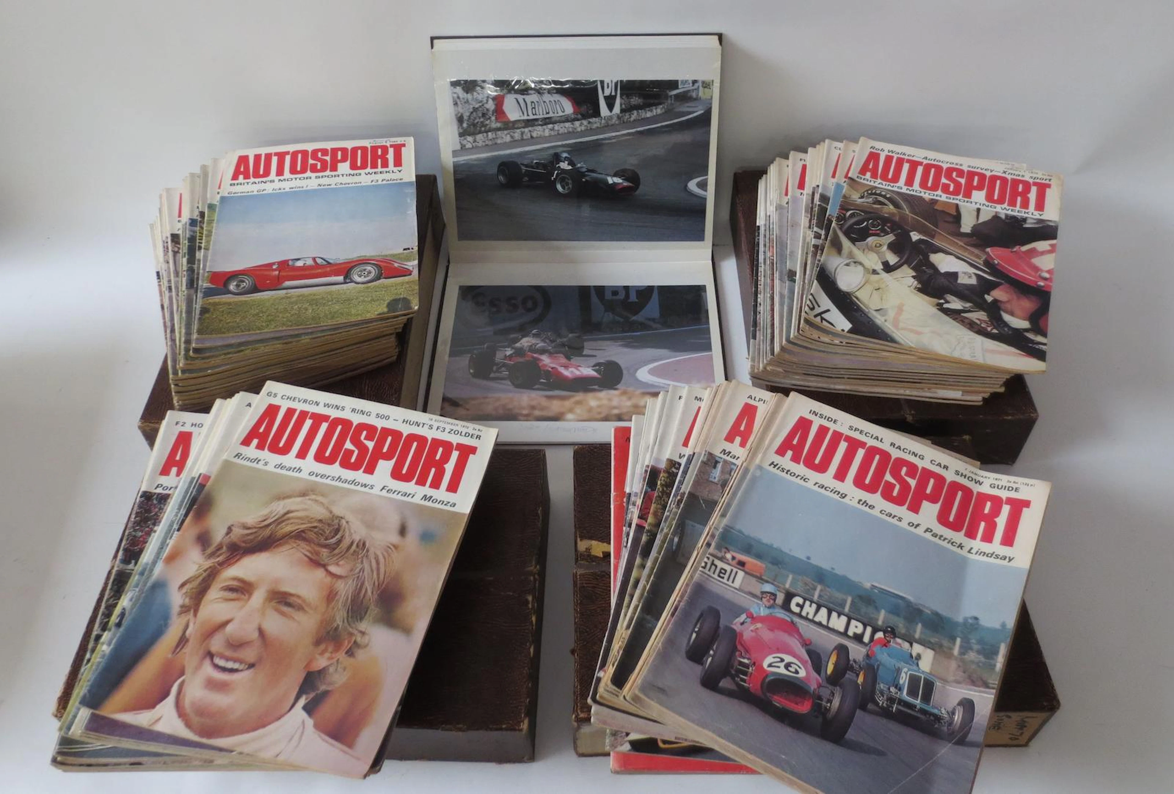 An album of motor racing photographs,