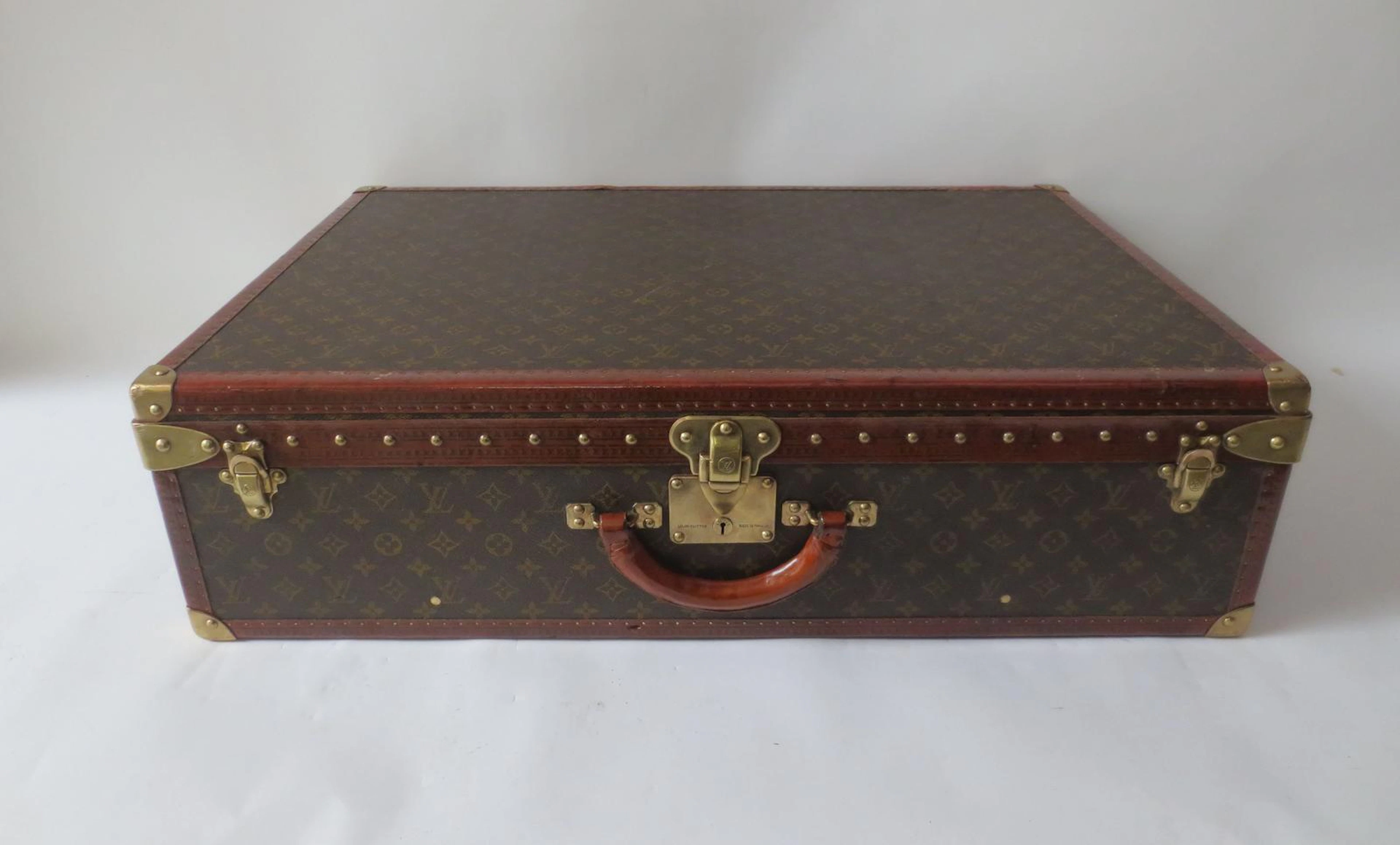 A Louis Vuitton 'Alzer' suitcase, circa 1950,
