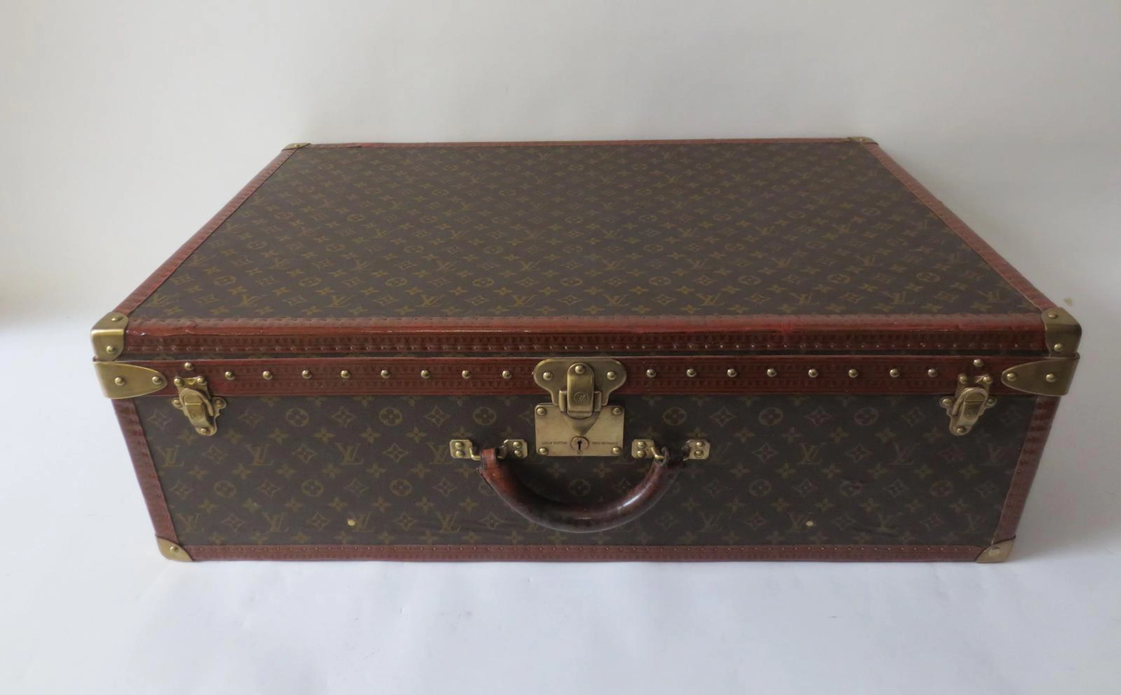 A Louis Vuitton 'Alzer Anglais' suitcase, circa 1950,