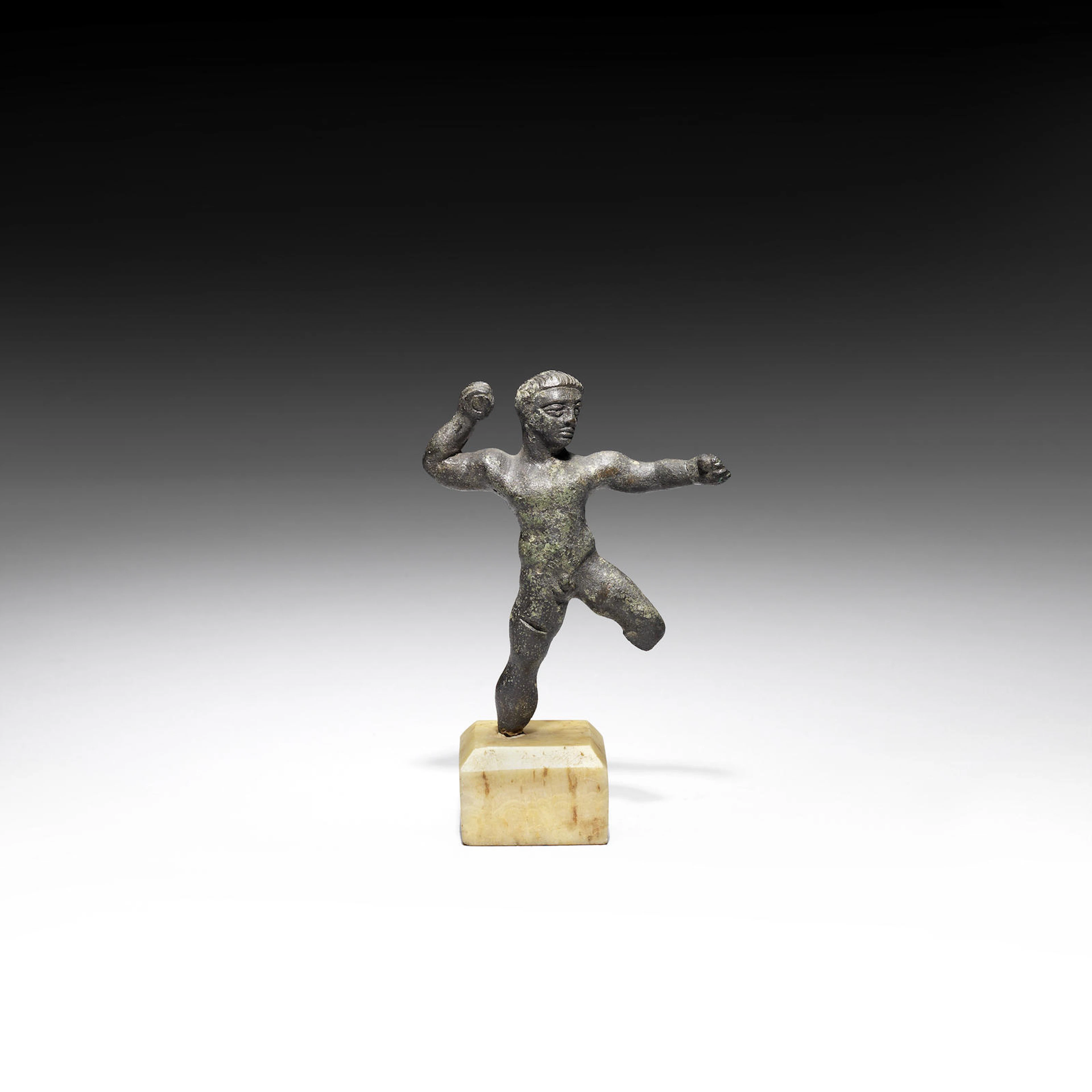 A Greek bronze figure of Herakles
