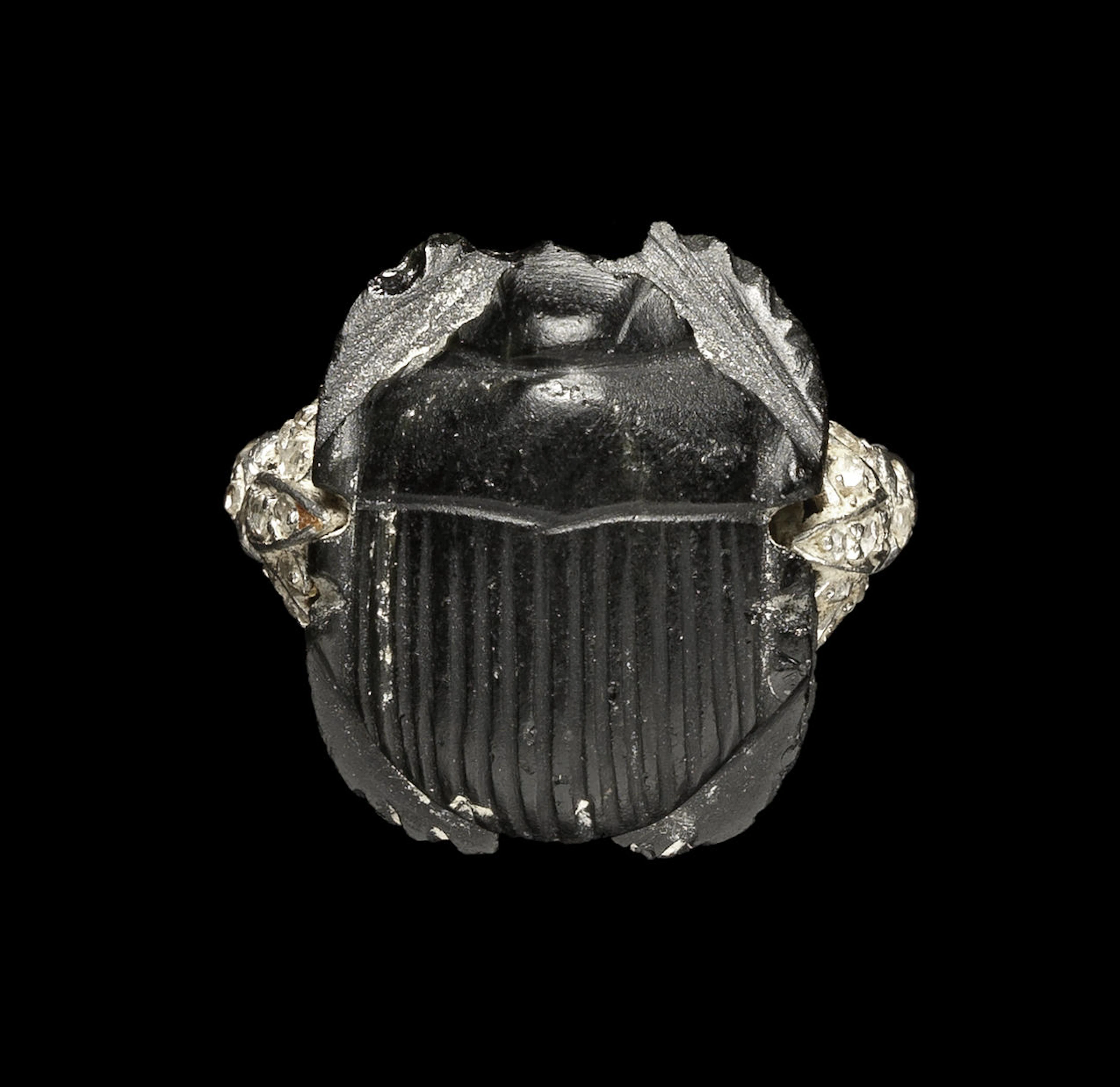 An Egyptian obsidian scarab